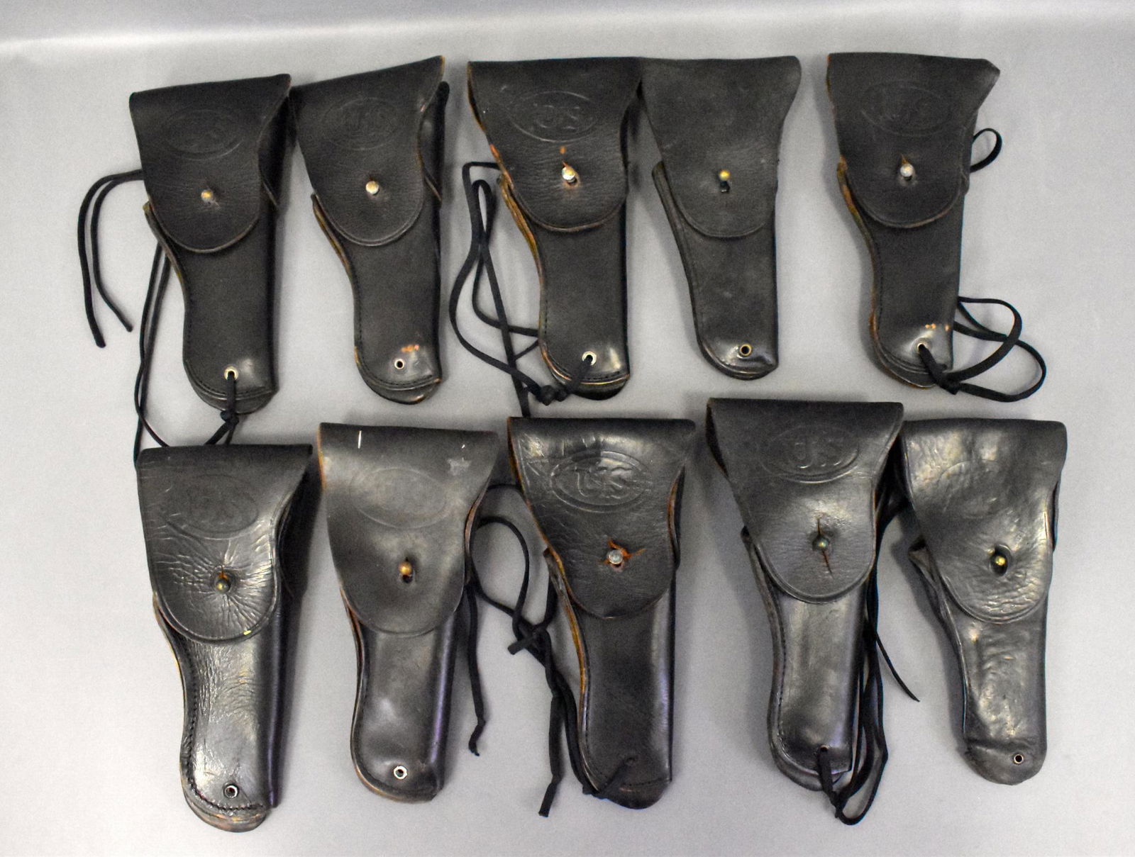 Lot of 10 post war Vietnam era military Colt 1911 .45: Lot of 10 post war Vietnam era military Colt 1911 .45 pistol leather holsters. Various conditions and makers. See photos