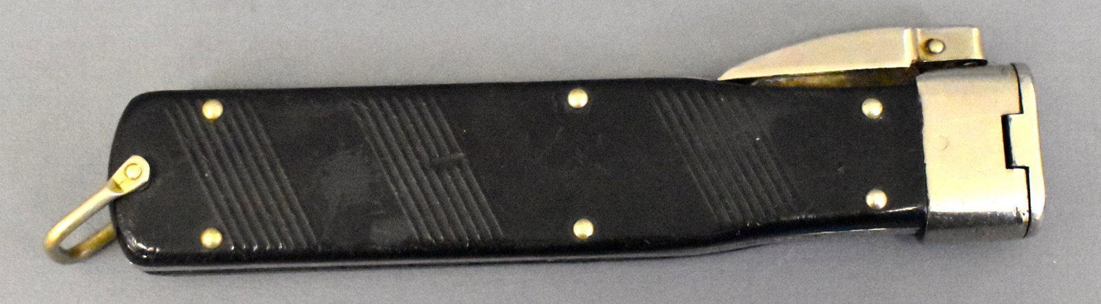German military post war gravity knife paratrooper: German military post war gravity knife paratrooper knife. Probably 1950s or 60s Has eagle on grip 3.5 inch blade 9 inches overall. VG condition Can only ship where permitted.