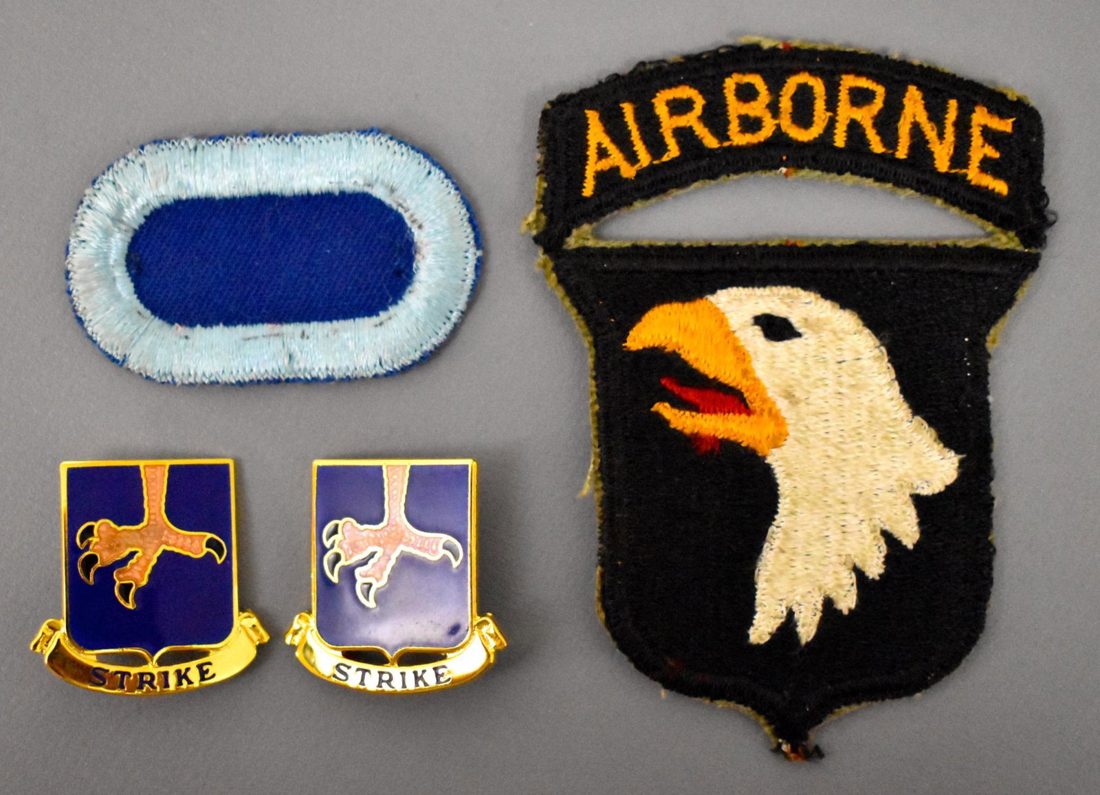 US WWII 101st Airborne 502nd PIR solid eye eagle patch: US WWII 101st Airborne 502nd PIR solid eye eagle patch, oval and 2 pin back Meyers marked DIs Distinctive Insignia.
