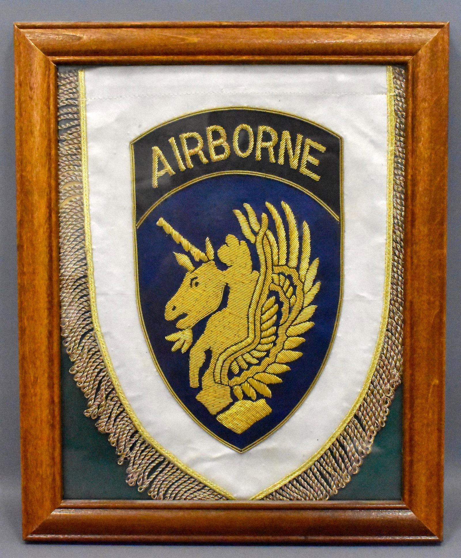 US WWII Army 13th Airborne bullion banner penent flag: US WWII Army 13th Airborne Unicorn bullion banner penent flag. Very high quality. Possible parade ceremonial item. 11 x 9 inch frame pennant is 9 x 7 inches Very good to excellent condition, rare Item
