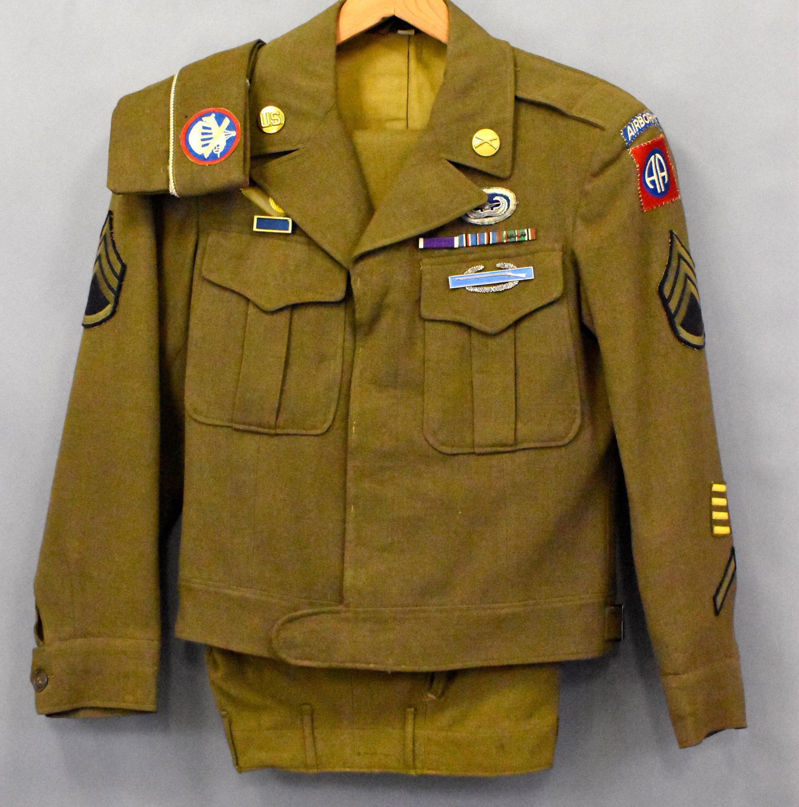 US WWII 82nd Airborne 325th GIR Co K D-Day Sgt R: US WWII 82nd Airborne 325th GIR Co K 3rd Platoon D-Day named to Tech Sgt R Sunbury uniform includes Ike jacket pants overseas cap has Glider wings on 325th oval CIB ribbons with 4 battle stars and 1 i