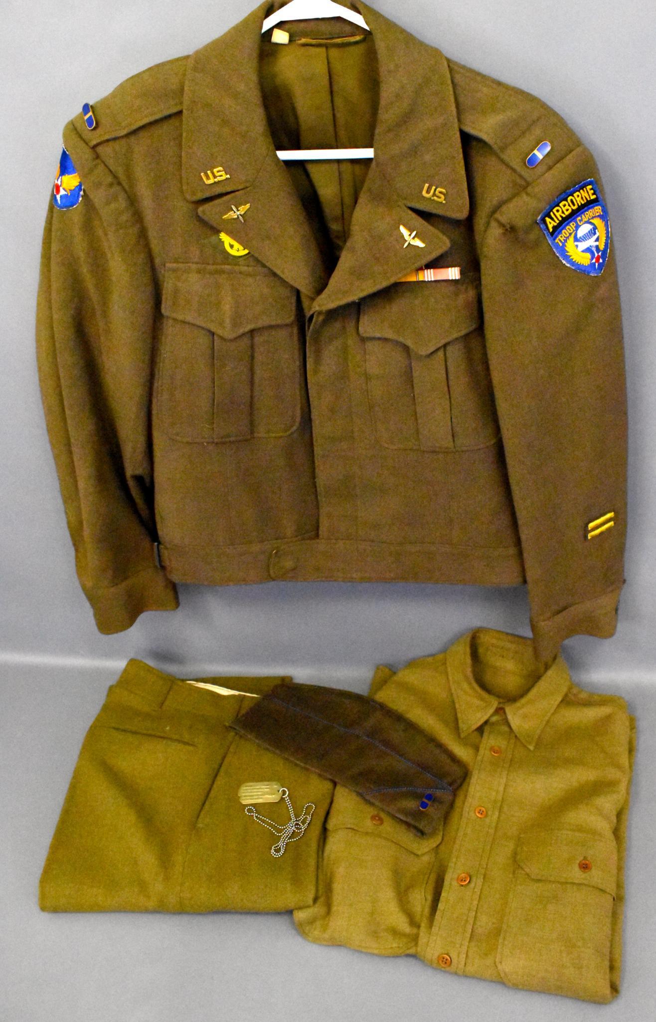 US WWII C O Pierce Airborne Troop Carrier Glider pilot: US WWII Warrant Officer Jg C. O. Pierce Airborne Troop Carrier Glider pilot uniform LGB marked glider pilot wings Ike jacket shirt and pants Overseas cap with glider wings dog tags ribbons and medals 