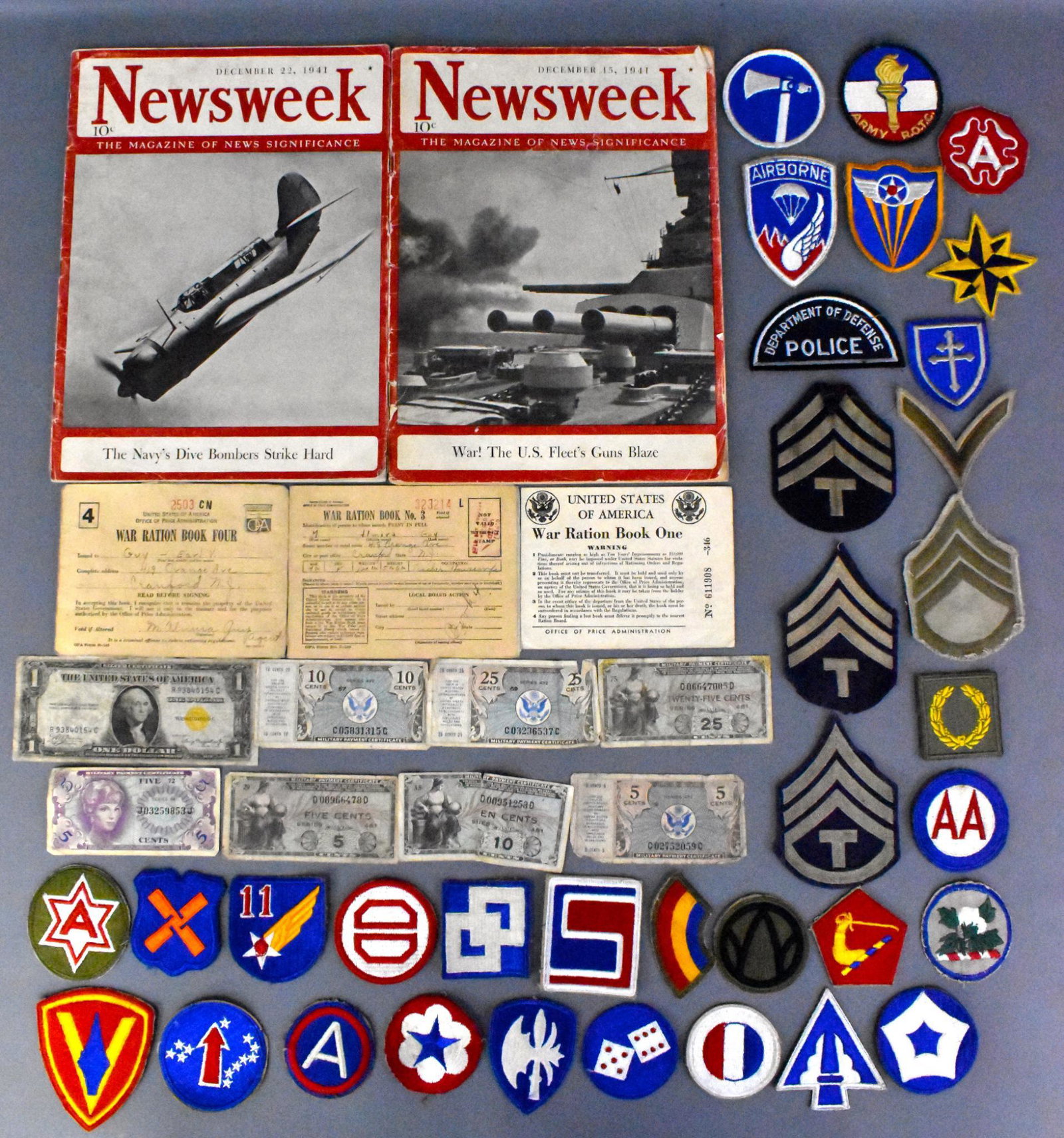 US WWII patches Ration books military money December: US WWII 33 patches 3 Ration books 8 military paper money including North Africa gold seal $1 bill 2 December 1941 Newsweek magazines from right after Pearl Harbor attack