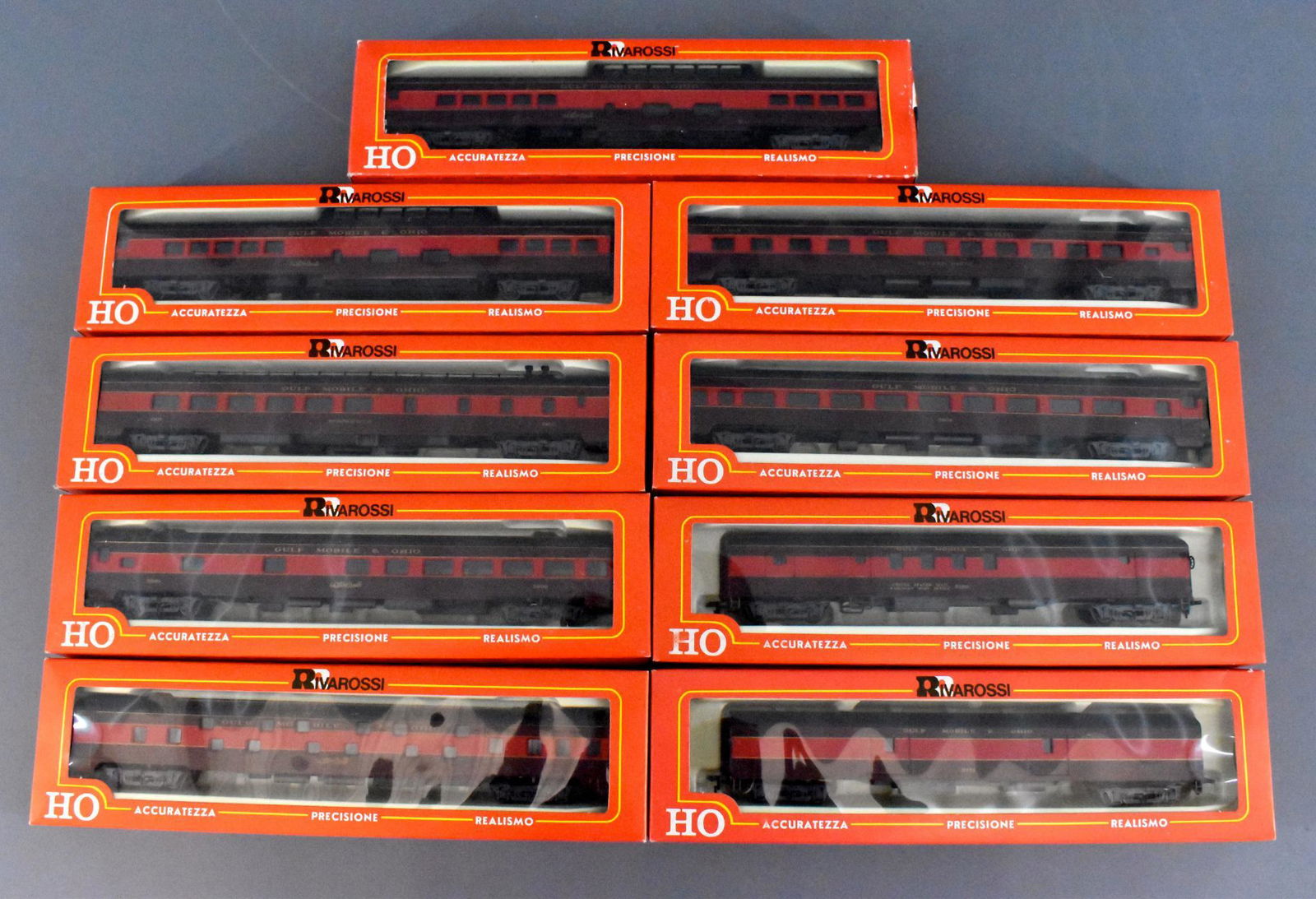 Nine Rivarossi HO Gulf, Mobile & Ohio The Alton Route: Nine Rivarossi HO Gulf, Mobile & Ohio passenger cars, mint in original boxes. Includes baggage, RPO, two vista dome, sleeper and four other coach / diner / sleeper cars, all unused and C9-10 in very g