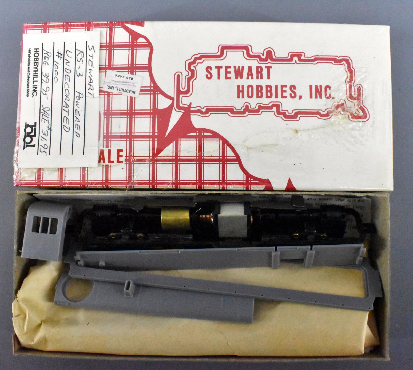 Two Stewart Hobbies HO undecorated Alco RS-3 powered: Two Stewart Hobbies undecorated Alco RS-3 powered Phase I locomotive kits, mint in original boxes. Both appear to be complete and untouched with original paperwork.