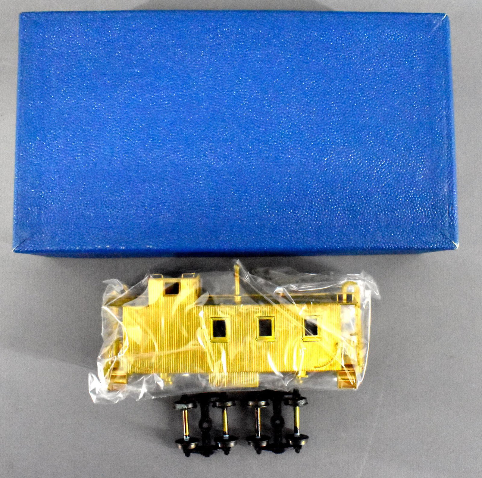 Lambert HO brass Great Northern #924 caboose in: Lambert HO brass Great Northern #924 caboose in original box with Central Valley trucks. Caboose is unused and C8 with some toning. Comes in a near mint original box without inserts.