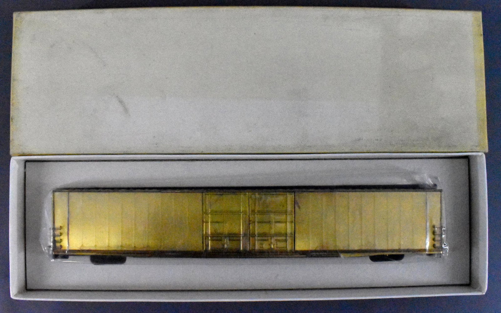 TID Trains Inc HO Brass Hi Cube Box Car in original box: TID Trains Inc HO Brass Hi Cube Box Car in Original Box. Car is C8-C9 with a few small spots of discoloration. This is the box car only no trucks are included. Box is in good condition with age discol