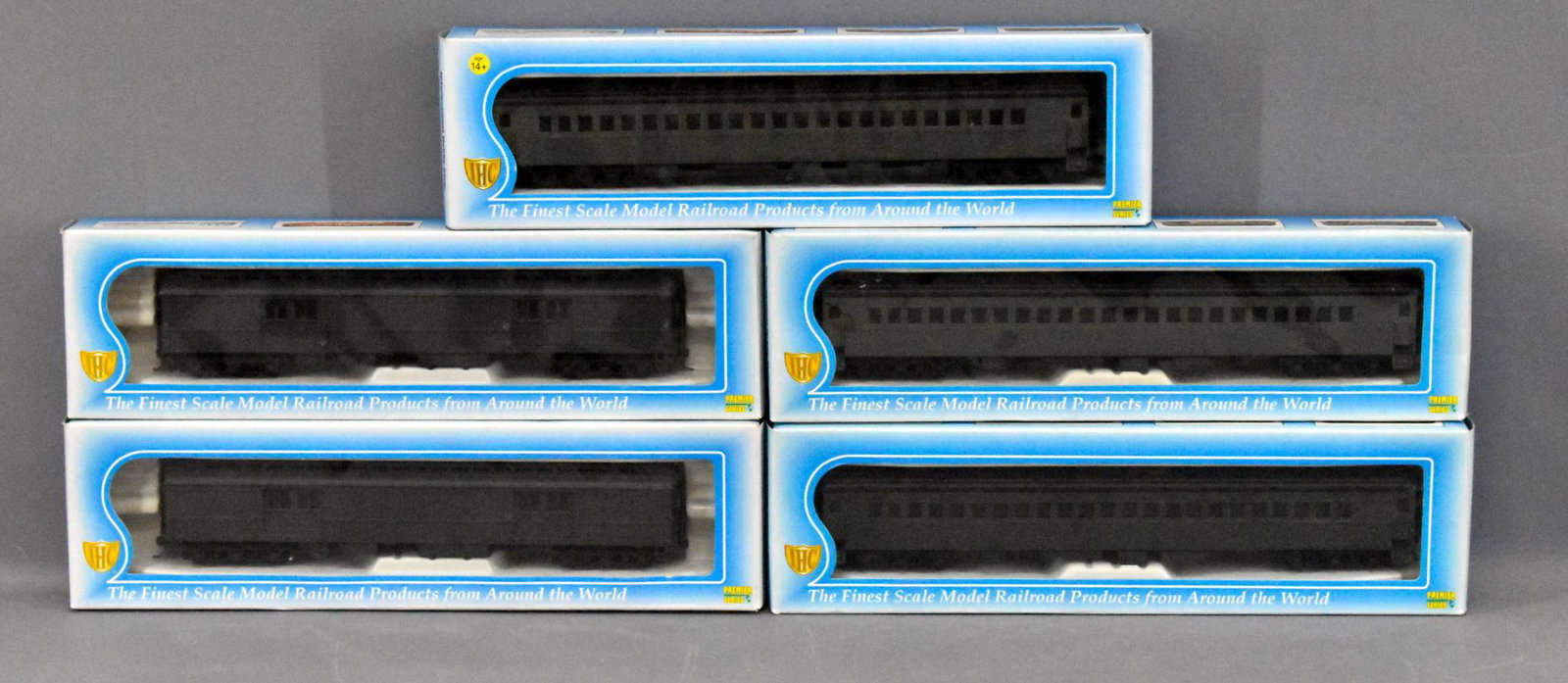 Five HO IHC passenger cars in OB: Five HO IHC passenger cars in original boxes, group includes 2 Erie Baggage cars, 2 Erie Coach cars, and a NYC coach, all appear new unrun in very good original boxes.