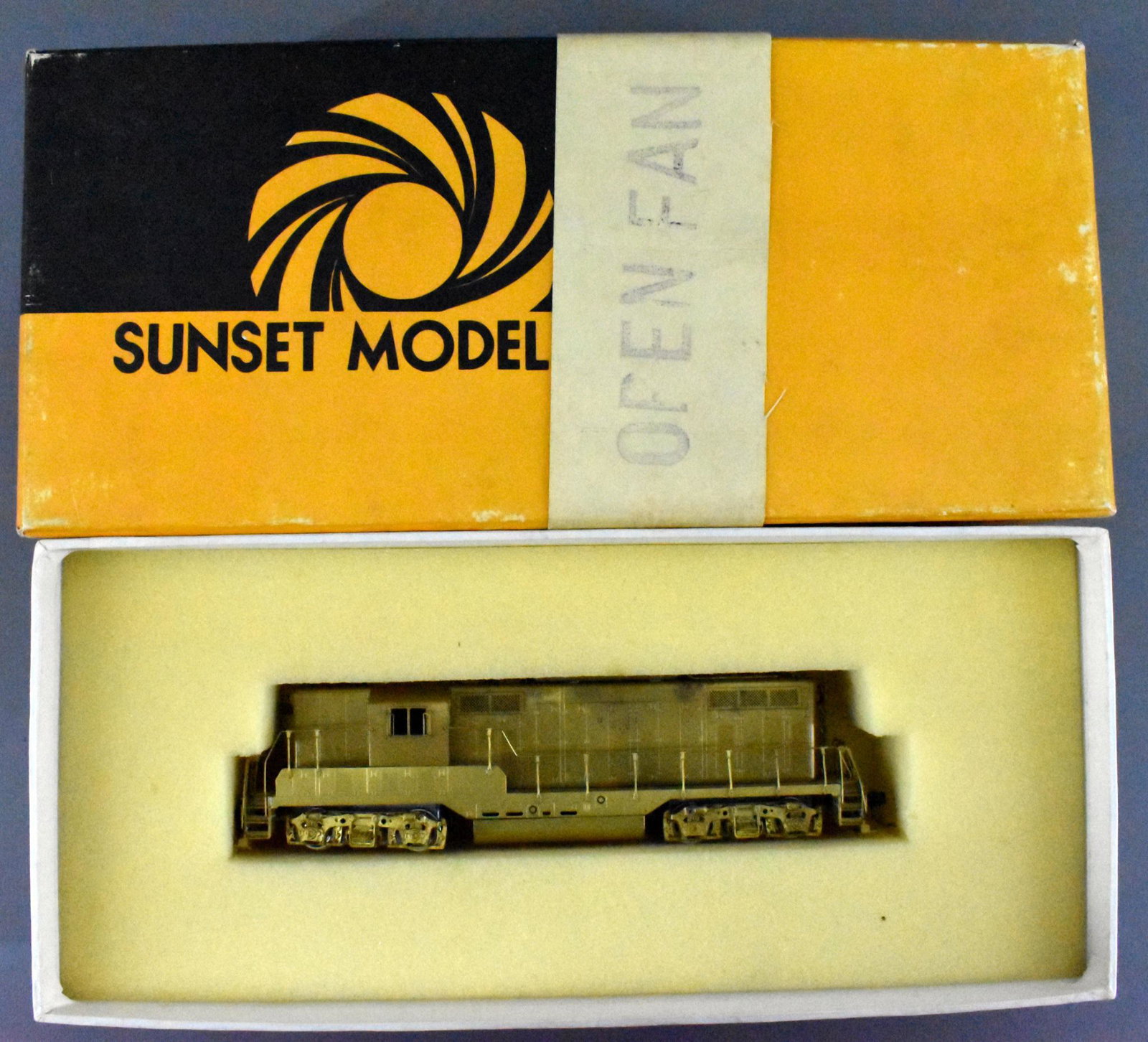 Sunset Models HO Brass EMD GP7 in OB: Sunset Models HO Brass EMD GP7 in original box , unfinished unrun, C7-8 due to toning, in an excellent original box.