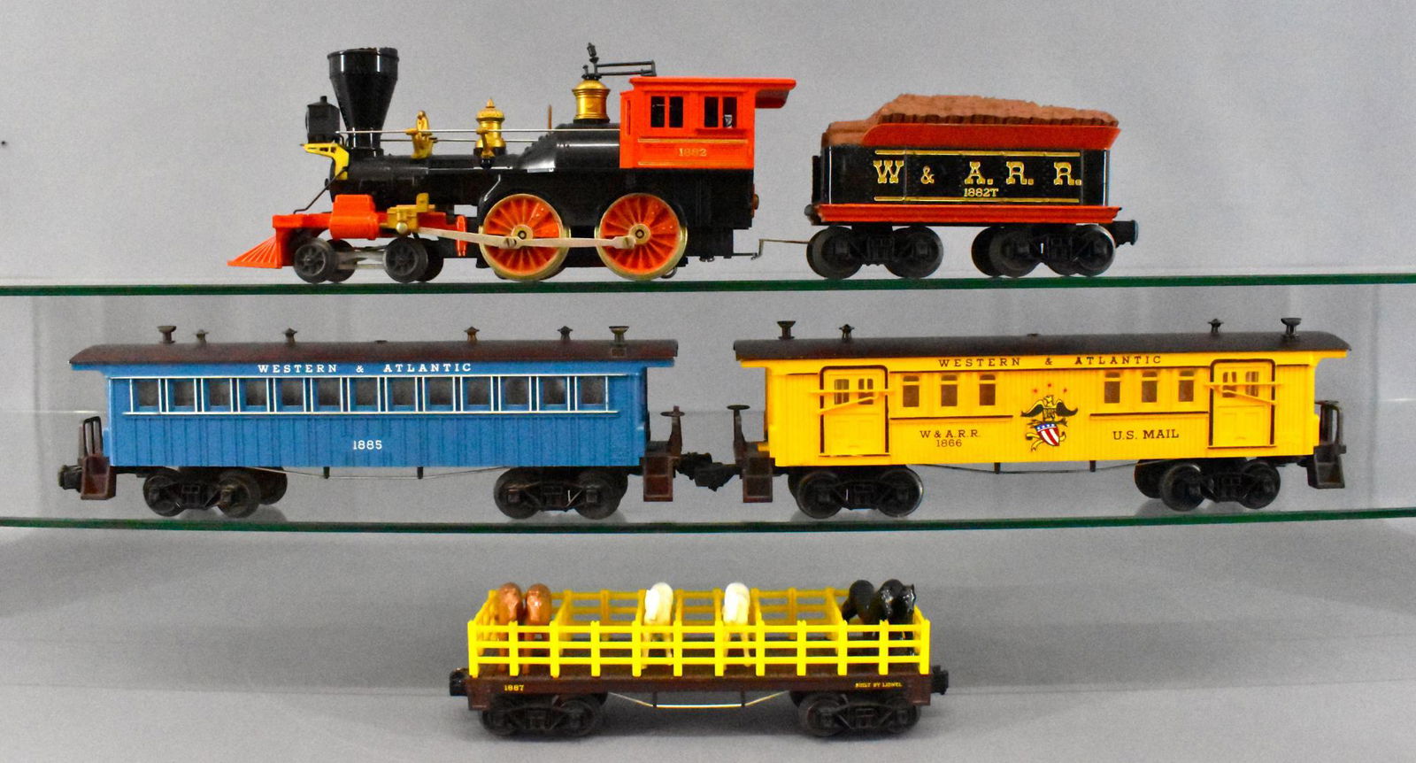 Lionel postwar O 1882 Halloween General set: Lionel postwar O 1882 Halloween General set. Includes 1882 General, 1882 Western & Atlantic tender, 1866 mail car, 1885 Western & Atlantic coach and 1887 flat car with horses. All but the 1885 show mo
