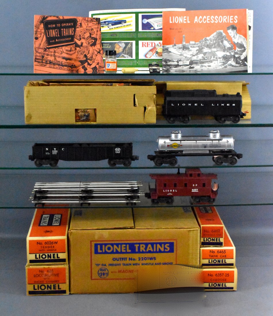 MINT Boxed Lionel postwar O 2201WS steam freight set: MINT Boxed Lionel postwar O 2201WS steam freight set. Set consists of 685 4-6-4 Hudson steam locomotive, 6026W tender, 6462 black gondola with dark stained barrels, 6465 tank car, and 6357-25 caboose.