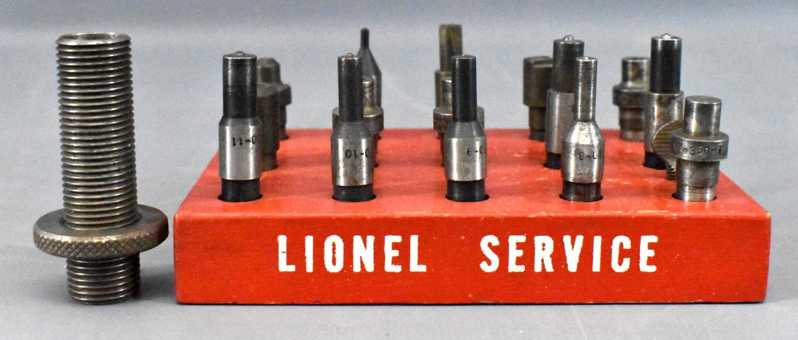Original Lionel postwar Dealer Service station ST-350: Origina Lionel postwar Dealer Service station ST-350 rivet press tool block and tools. The block is in excellent condition and very clean and includes ST-350-7 through ST-350-17 and St-350-19 thropugh