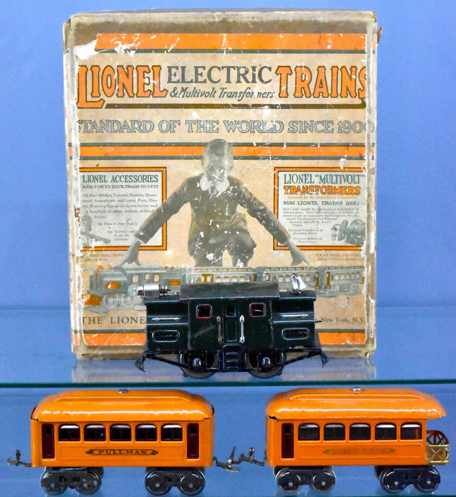 Lionel prewar O gauge Gimbel Special #2 in original box: Lionel prewar O gauge Gimbel Special #2 in original box. Set includes dark green 153 electric locomotive, 603 Pullman and 604 observation car in orange with maroon window inserts. Locomotive is C5-6, 