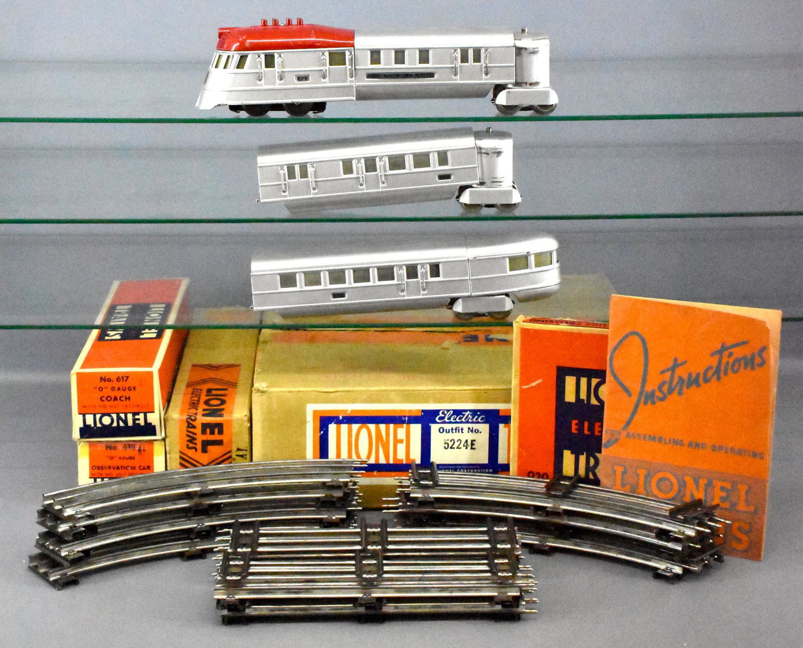 Very Desirable Boxed Lionel prewar O gauge 5224E: Very Desirable Boxed Lionel prewar O gauge 5224E Aluminum Red-top Flying Yankee. Set consists of 616E powered car, 617 coach, 618 observation car, two 617T vestibules, track and 90 degree crossover. T