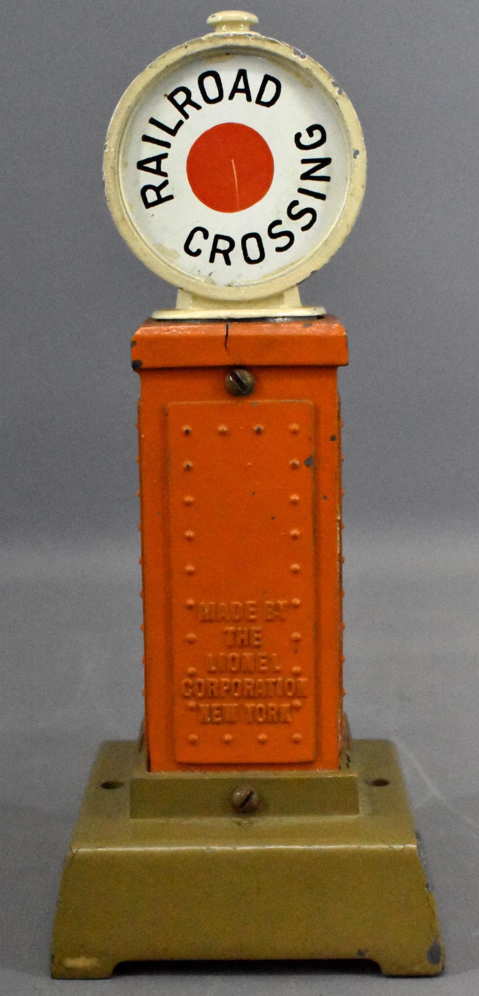Lionel prewar 87 flashing crossing signal Mojave /: Lionel prewar 87 flashing crossing signal in Mojave and Terra Cotta, C6 with one fatigue pop that is missing and another that is ready to come off, other minor fatigue and some paint chips.