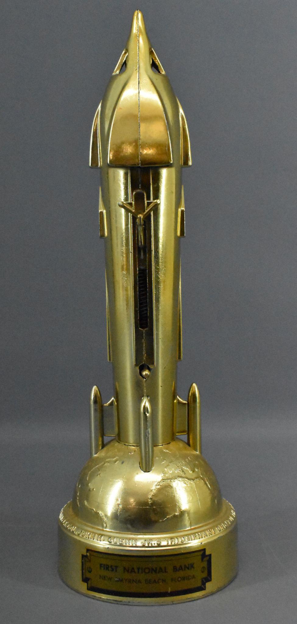 Vintage Duro Mold Gold Rocket Bank: Vintage Duro Mold Gold Rocket Bank, bank is in excellent condition, with nice gold plating throughout, very few, minor rubs are present. The mechanism works, the lock plate is here, it is missing the 