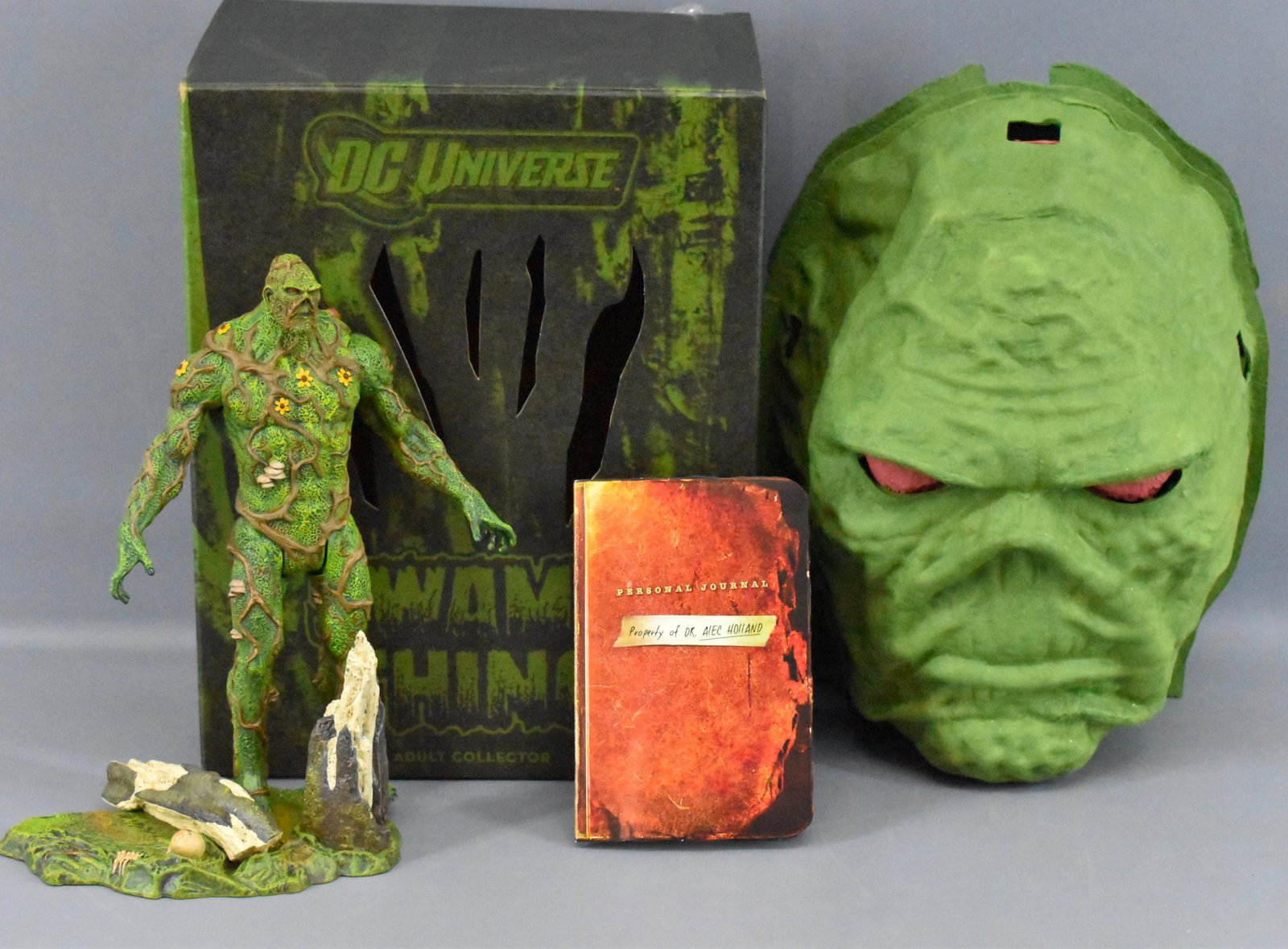 DC Universe Exclusive Swamp Thing Figure with stand: DC Universe Exclusive Swamp Thing Figure with stand, it is like new in the box. It looks to have just been opened to examine contents, no dust or issues to suggest it was ever displayed.