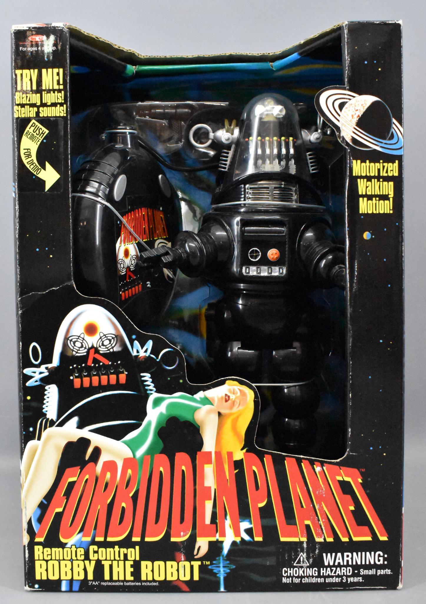 Trendmasters RC Forbidden Planet Robby Robot mint in: Trendmasters radio controlled Forbidden Planet Robby Robot, factory sealed in original box, very nice with light shelf wear.