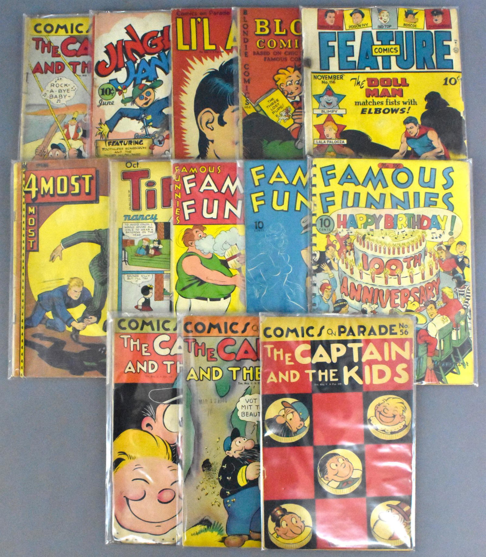 Group of vintage 1940's and 50's 10 cent comic books: Group of vintage 1940's and 50's 10 cent comic books to include such titles as 4 Most, Comics on Parade, Tip Top, Famous Funnies, Jingle Jangle, Feature and Blondie, all range from fair to very good.