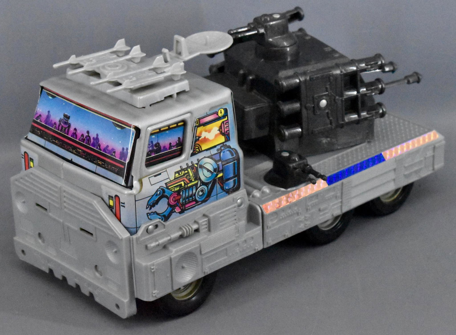 Rare Ertl Star Tran robot futuristic semi tractor with: Rare Ertl Star Tran robot futuristic semi tractor with guns and radar dish. A very rare variation that may be a one of a kind piece. I have done research and found other Star Tran pieces but not a sin