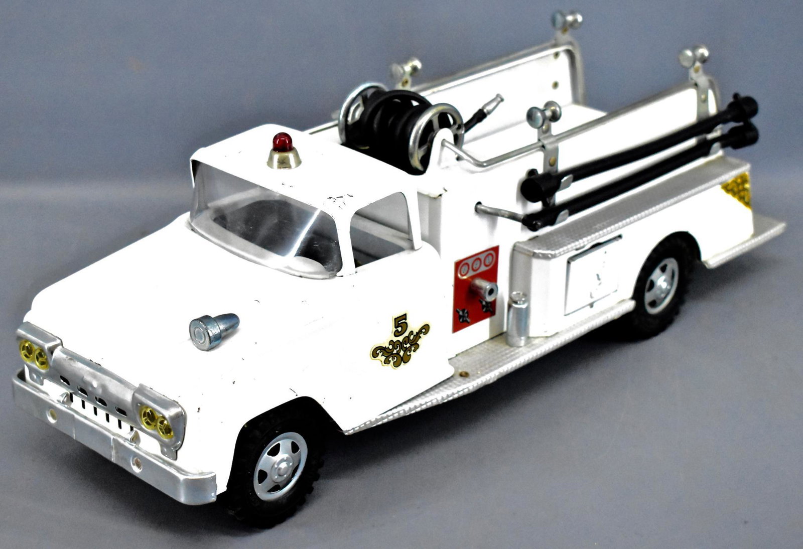 Scarce ALL ORIGINAL 1959 Tonka pressed steel fire: Scarce 1959 Tonka pressed steel fire pumper truck, all original and in super condition with minor play wear as seen in the photos. Includes both hoses and ladder but is missing the hydrant.