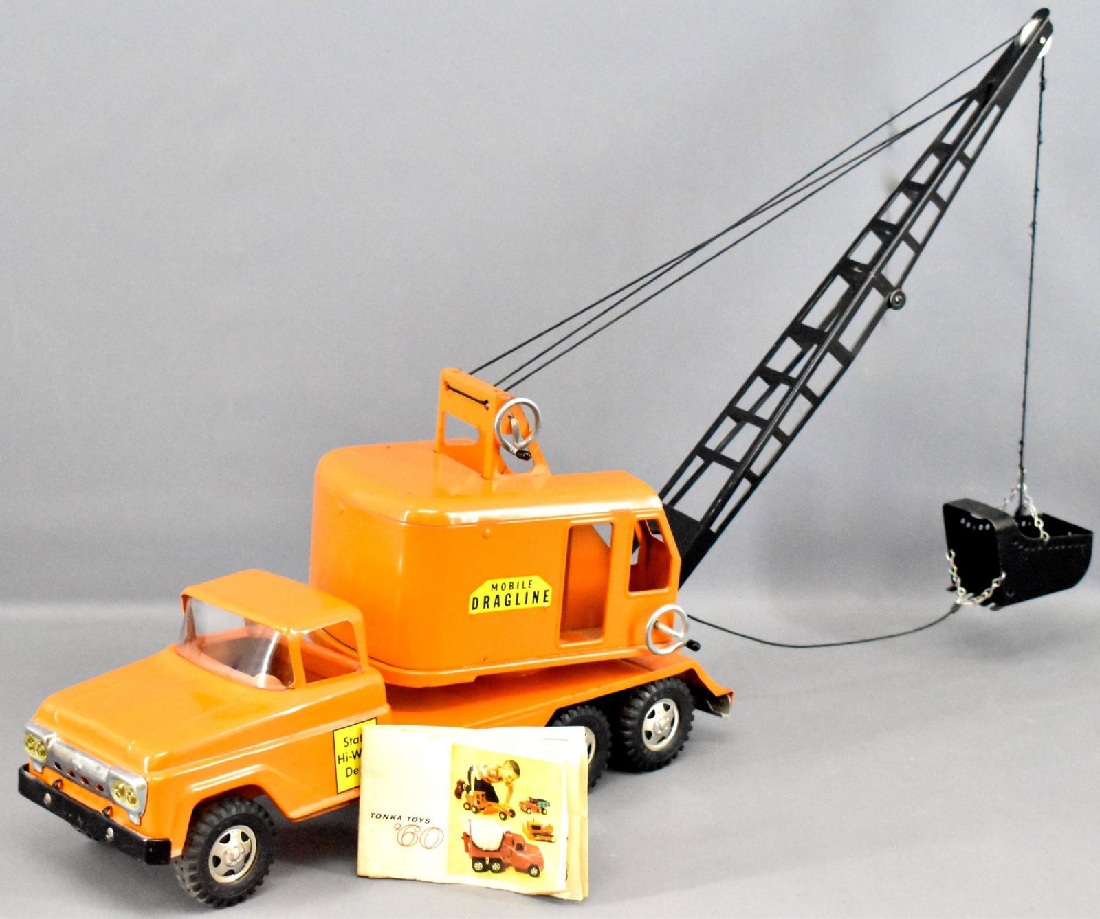1960 Tonka pressed steel State Hi-Way Mobile Dragline: 1960 Tonka pressed steel State Hi-Way Mobile Dragline, all original and in superb condition with a 1960 catalog. Shows little, if any play wear although there are some tiny paint pops here and there.