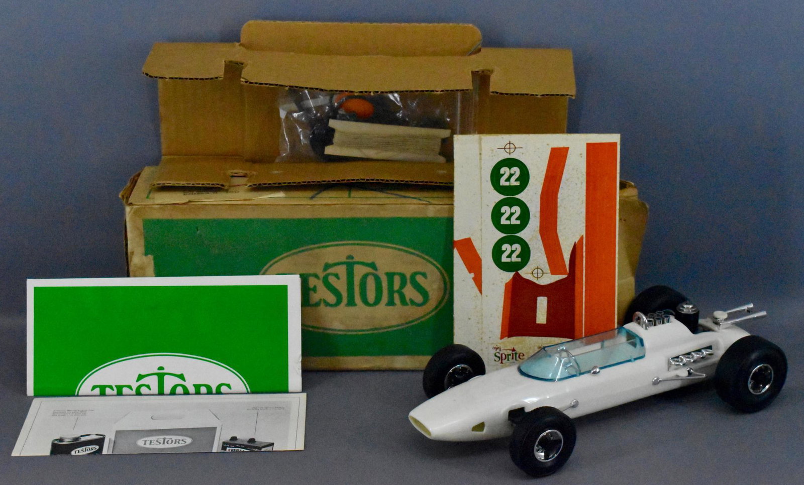 Testors Sprite Indy racer gas tether car mint in: Testors Sprite Indy racer gas tether car mint in original box. The original box has been opened but the contents are brand new and never used.