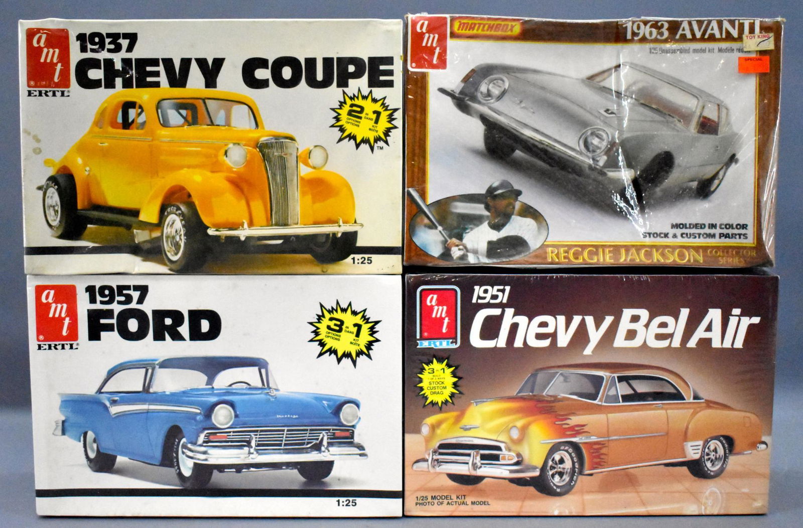 Four factory sealed AMT Ertl 1/25 scale model kits: Four factory sealed AMT Ertl 1/25 scale model kits to include 6579 1937 Chevy coupe, 6584 1957 Ford, 6607 1951 Chevy Bel Air and PK-4181 1963 Avanti, all perfectly sealed in near mint original boxes.