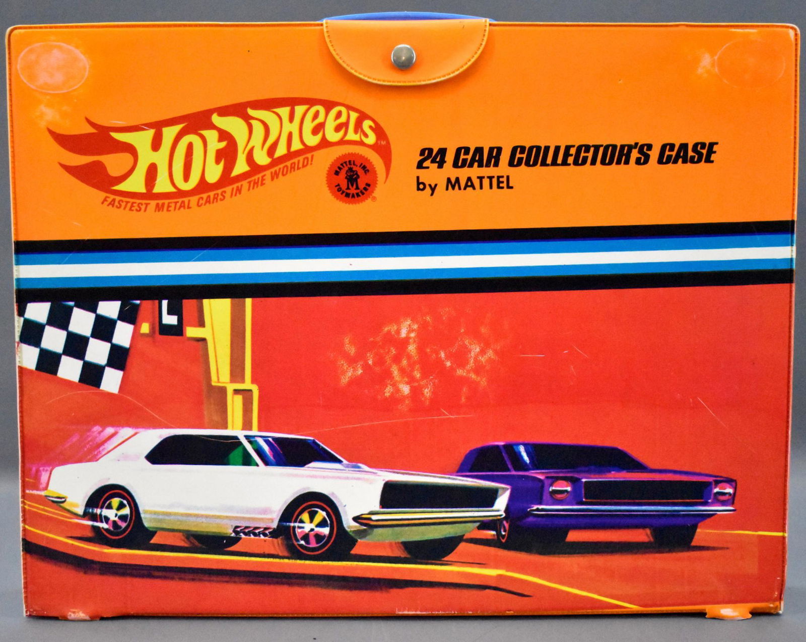 Mattel Redline era Hot Wheels 24 car carrying case: Mattel Redline era Hot Wheels 24 car carrying case. Has splits in the vinyl, scratches on the outside and writing in pen on the inside.