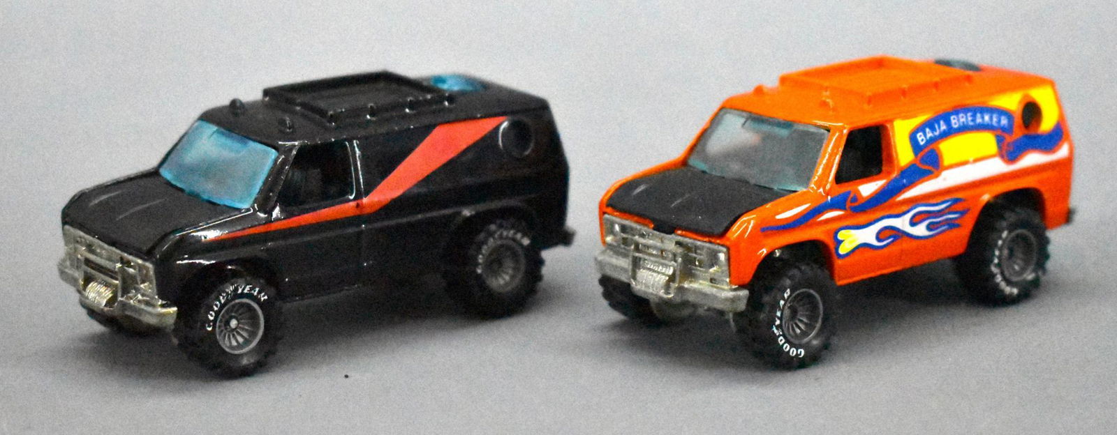 Two different Mattel Hot Wheels Real Riders Baja: Two different Mattel Hot Wheels Real Riders Baja Breaker vans to include one black and one orange, both in excellent condition as seen in the photos.