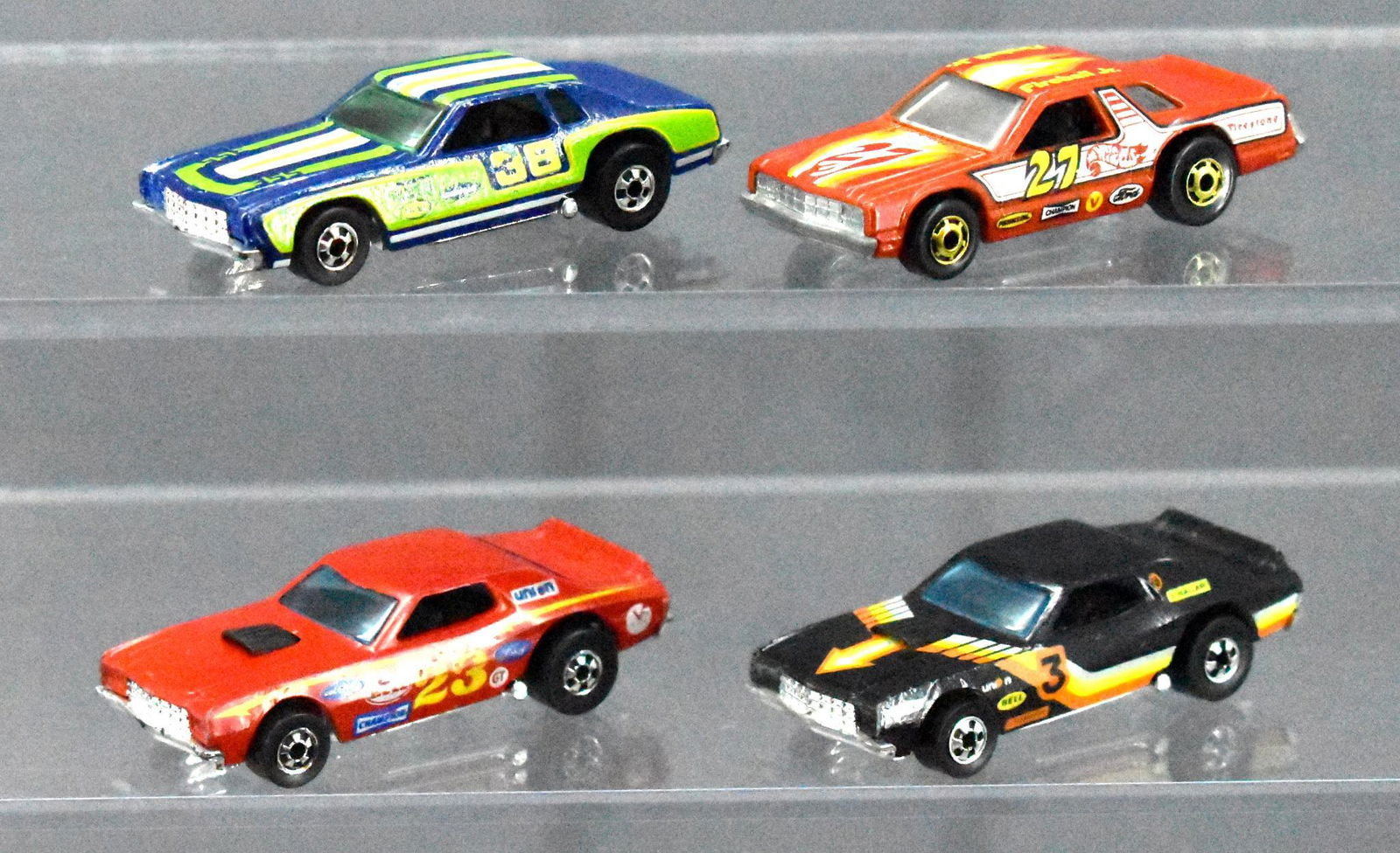 Four different Blackwall Hot Wheels stock cars: Four different Blackwall Hot Wheels stock cars to include Front Runnin Fairmont, two Torino (one black and one red) and Monte Carlo, all in very nice with minor paint issues but are still very nice as