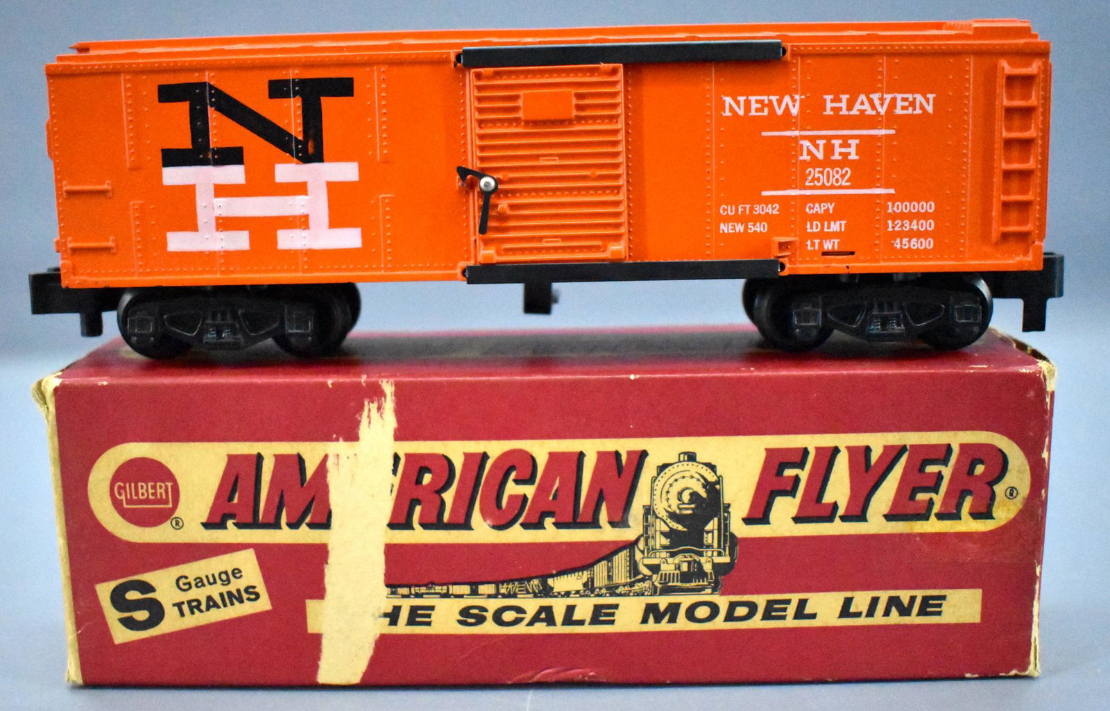 American Flyer S gauge 25082 New Haven box car in: American Flyer S gauge 25082 New Haven box car in original box, very light run time and clean but missing the brake wheel, C7with a complete but worn original box.