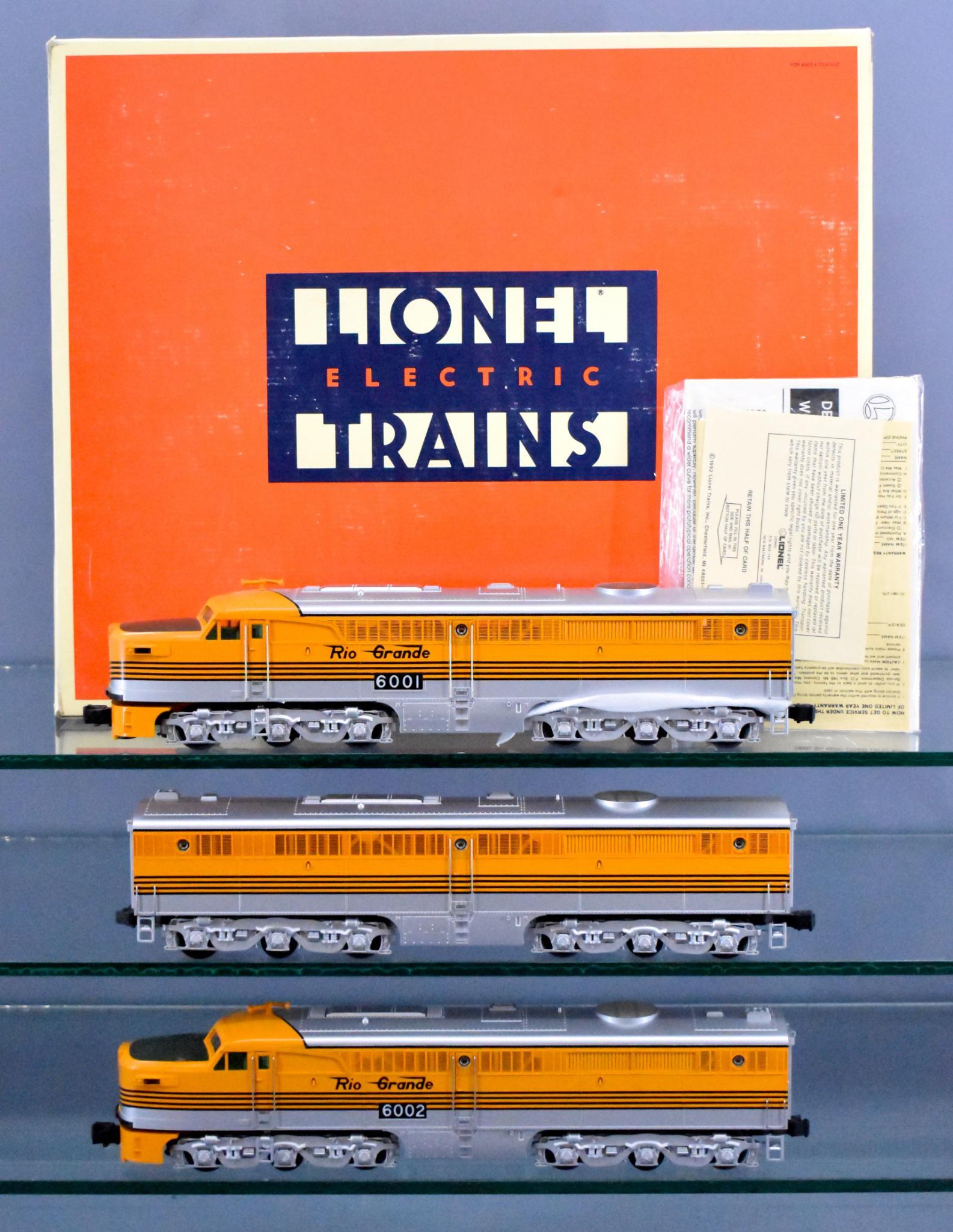 Lionel O gauge Rio Grande Alco PA ABA set in original: Lionel O gauge Rio Grande Alco PA ABA set in original box, 18107. All three show moderate run time and the nose of the non-powered unit shows some kind of repaint or repair. The powered A and B unit a