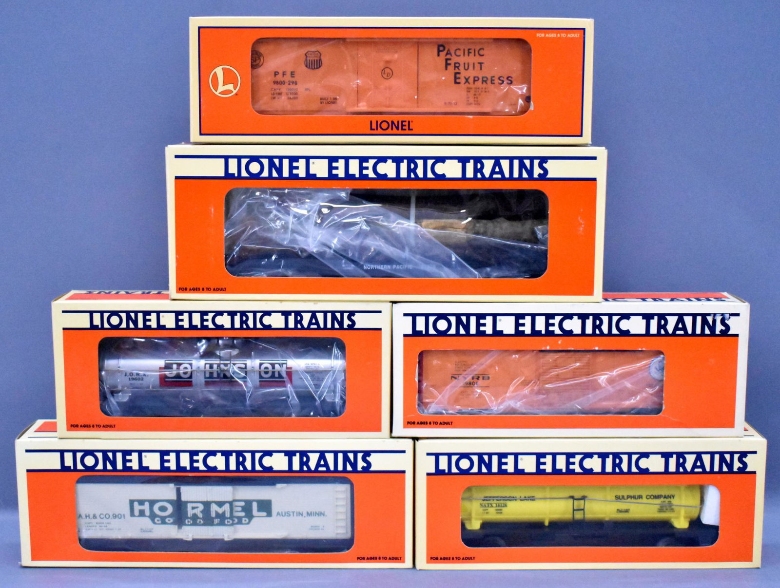 Six Lionel O gauge freight cars in original boxes: Six Lionel O gauge freight cars in original boxes to include 17315 Pacific Fruit Express reefer, 19532 Hormel reefer, 17510 Northern Pacific flat car, 16126 jefferson lake three dome tank car, 19808 N