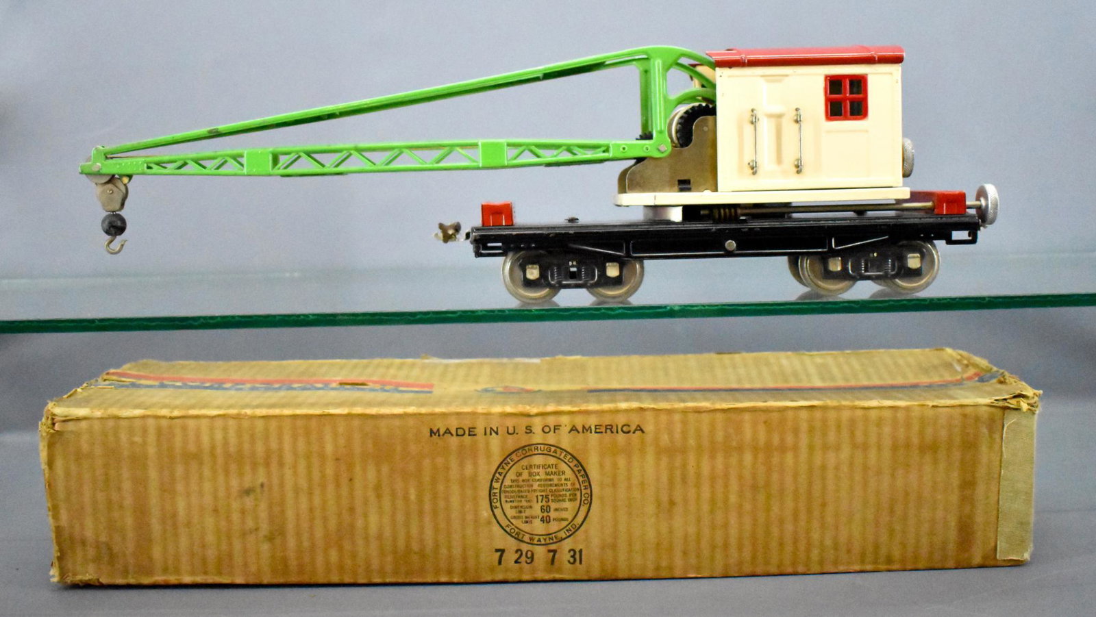 Lionel prewar standard gauge 219 derrick car in: Lionel prewar standard gauge 219 derrick car in original box with cream cab and red roof, all original and clean, C7 with a good original box.