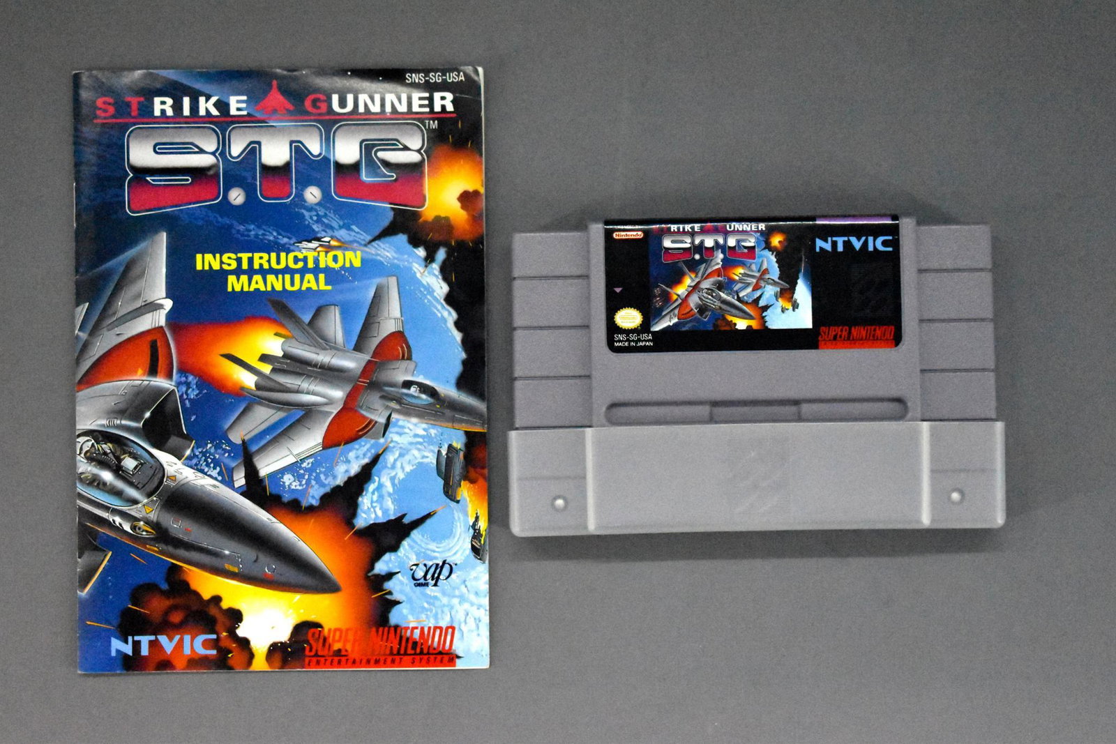 SNES Super Nintendo STG Strike Gunner cartridge with: SNES Super Nintendo STG Strike Gunner cartridge with manual, both are in excellent condition as seen in the photos. Game is untested.