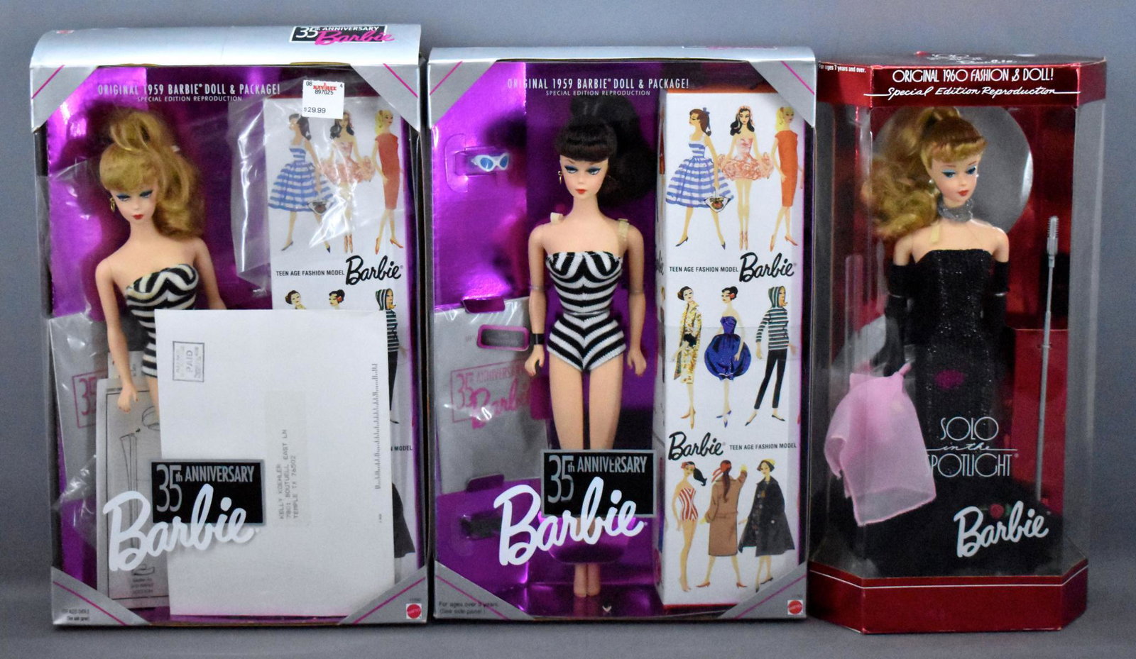 Three reproduction Barbies MIB NRFB: Three reproduction Barbies, two are mint in original box, never removed from boxes, one has been removed as seen in the photos.
