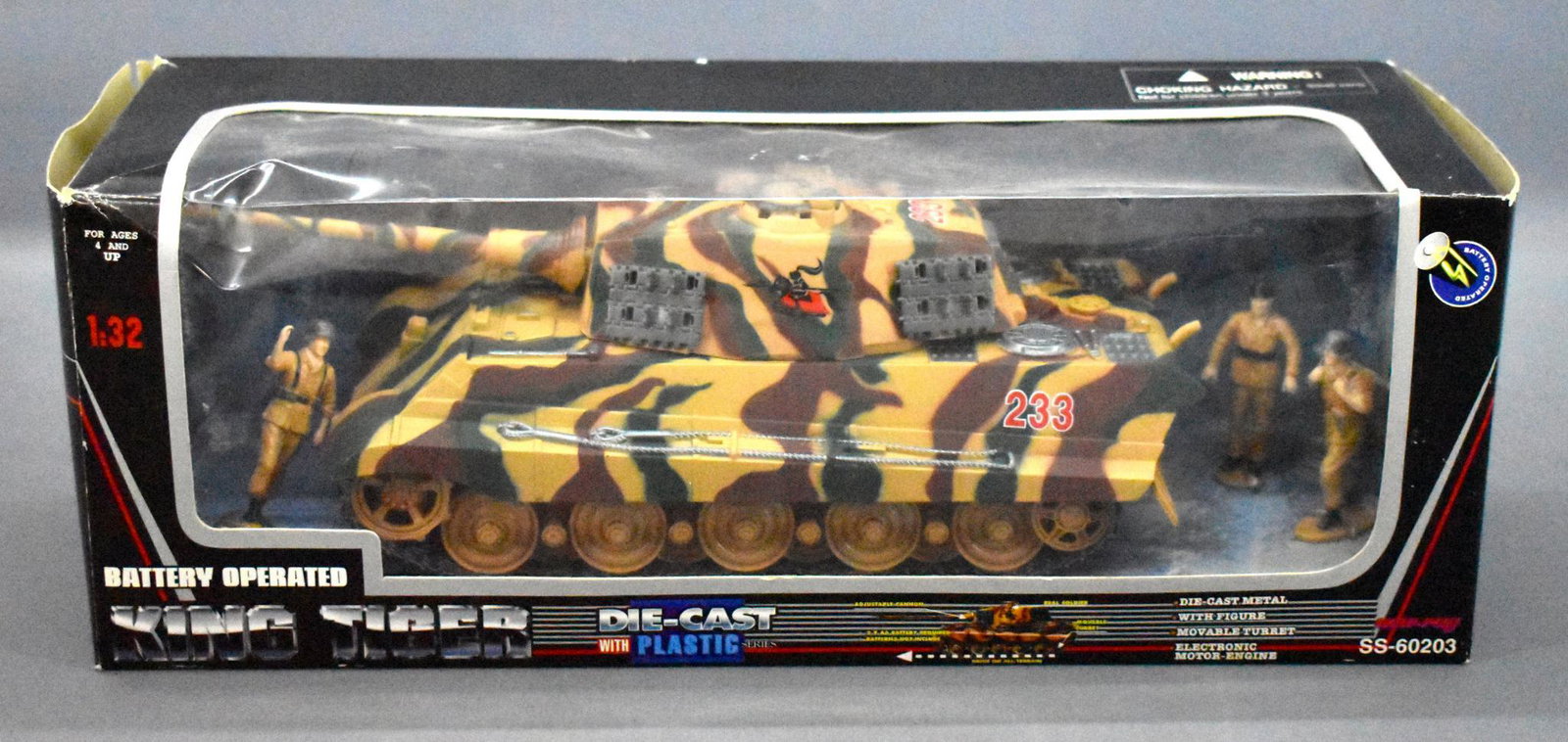 New-Ray battery operated 1:32 King Tiger tank mint in: New-Ray battery operated 1:32 King Tiger tank mint in original box. Set has never been removed and includes three figures, the box does have some wear as seen in the photos.
