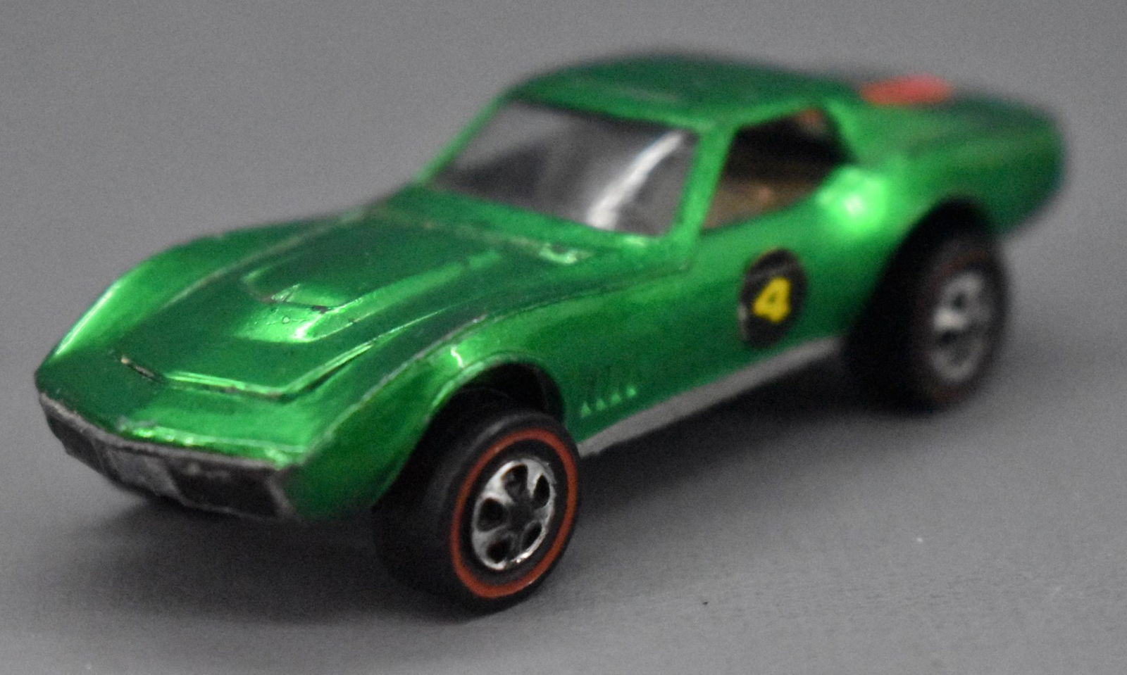Redline Hot Wheels gree US Custom Corvette: Redline Hot Wheels gree US Custom Corvette, nice and clean with some edge wear and a rub across the roof with a dull base.