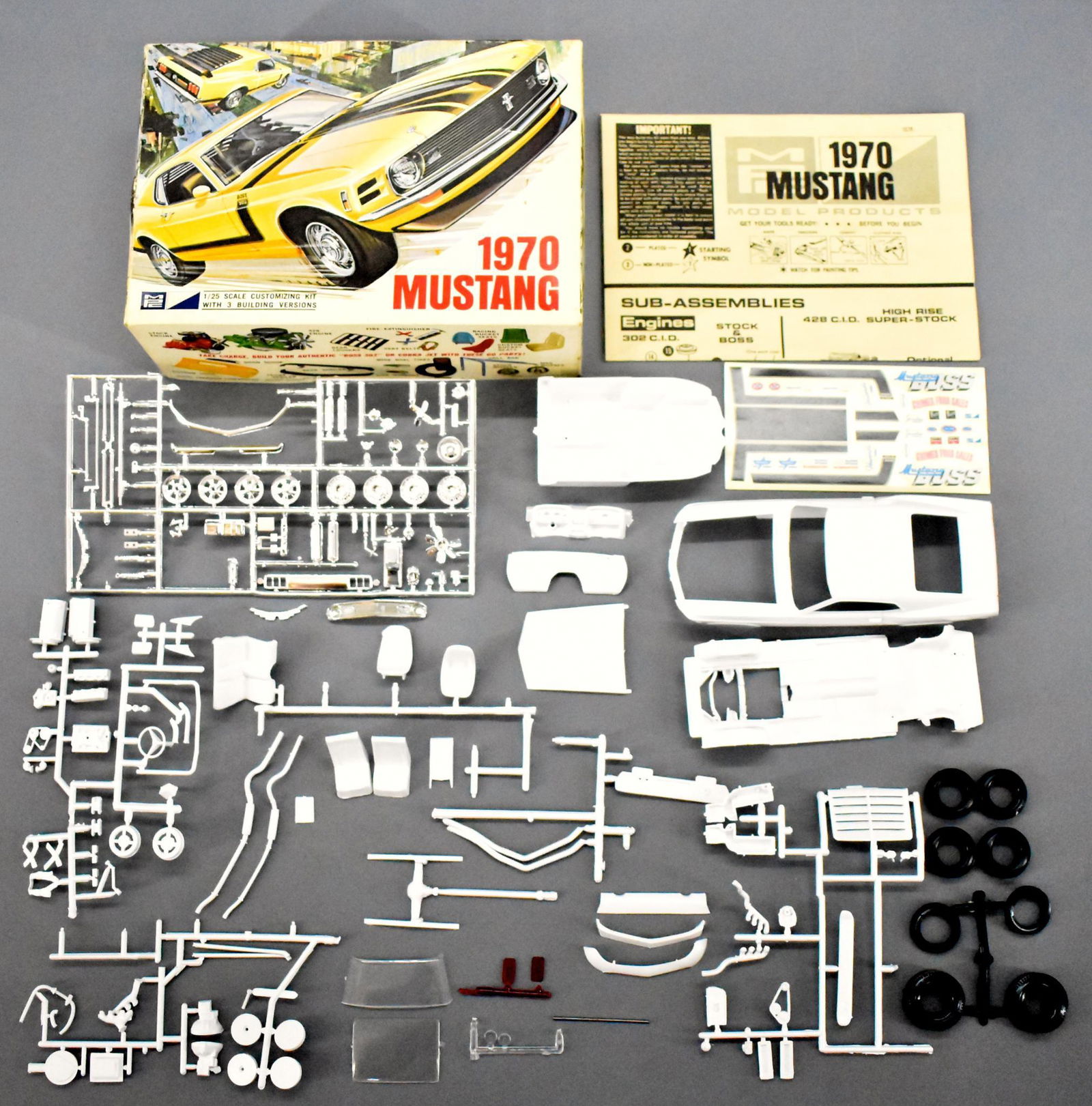 Unbuilt MPC 1970 Ford Mustang Boss 302 1/25 scale model: Unbuilt MPC 1970 Ford Mustang Boss 302 1/25 scale model kit in original box. This is an open box, open bag kit, super clean parts, appears complete but could be missing a tiny part or two, comes with