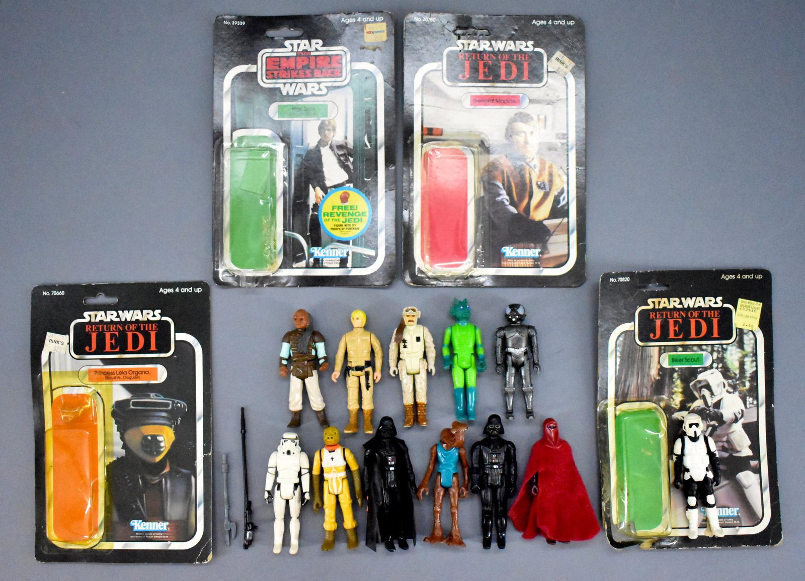 Group of vintage 1970's and 80's Star Wars figures with: Group of vintage 1970's and 80's Star Wars figures with four blister cards. Includes twelve original figures that have been played with and four blister cards that are mostly complete but has crushing