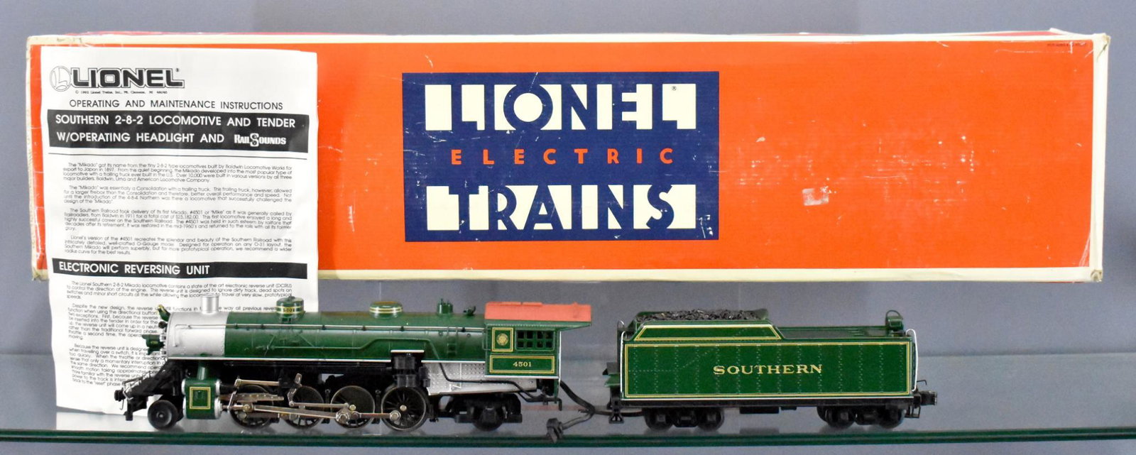 Lionel modern era O 18018 Southern 2-8-2 Mikado steam: Lionel modern era O 18018 Southern 2-8-2 Mikado steam locomotive in original box, shows moderate run time but is clean and C7 in a moderately worn original box with original paperwork.