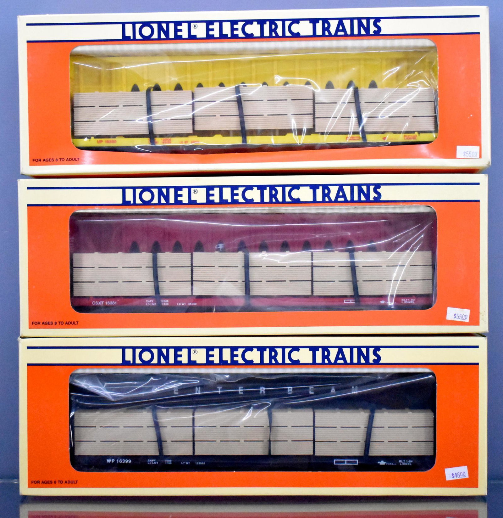 Three Lionel modern era O Center I beam flat cars in: Three Lionel modern era O Center I beam flat cars in original boxes to include 16399 Western Pacific, 16381 CST and 16380 Union Pacific, C8-9 in very good to excellent original boxes.