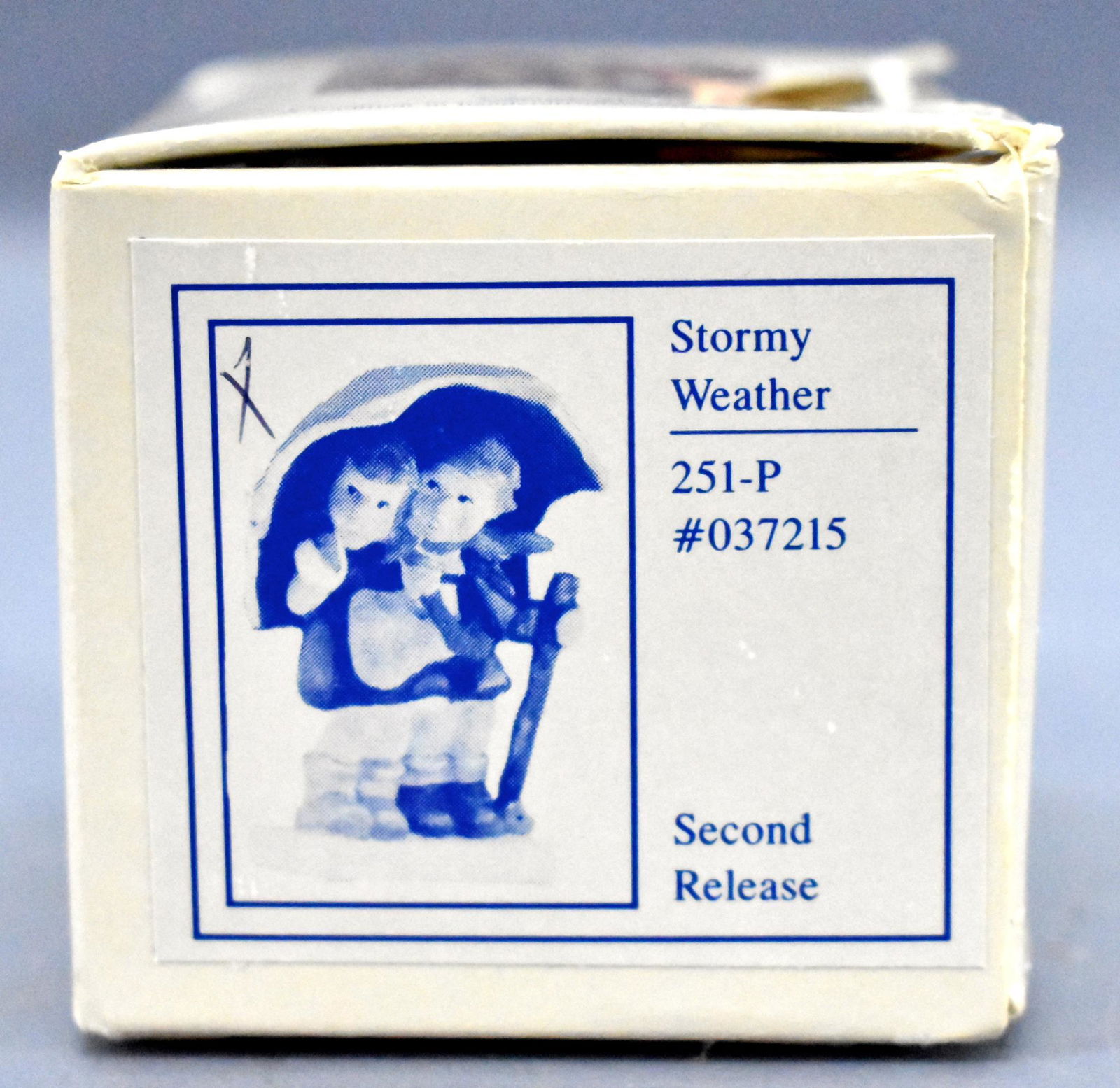 Goebel Hummel Stormy Weather miniature figurine in: Goebel Hummel Stormy Weather miniature figurine in original box 251-P, near mint with a fair original box.