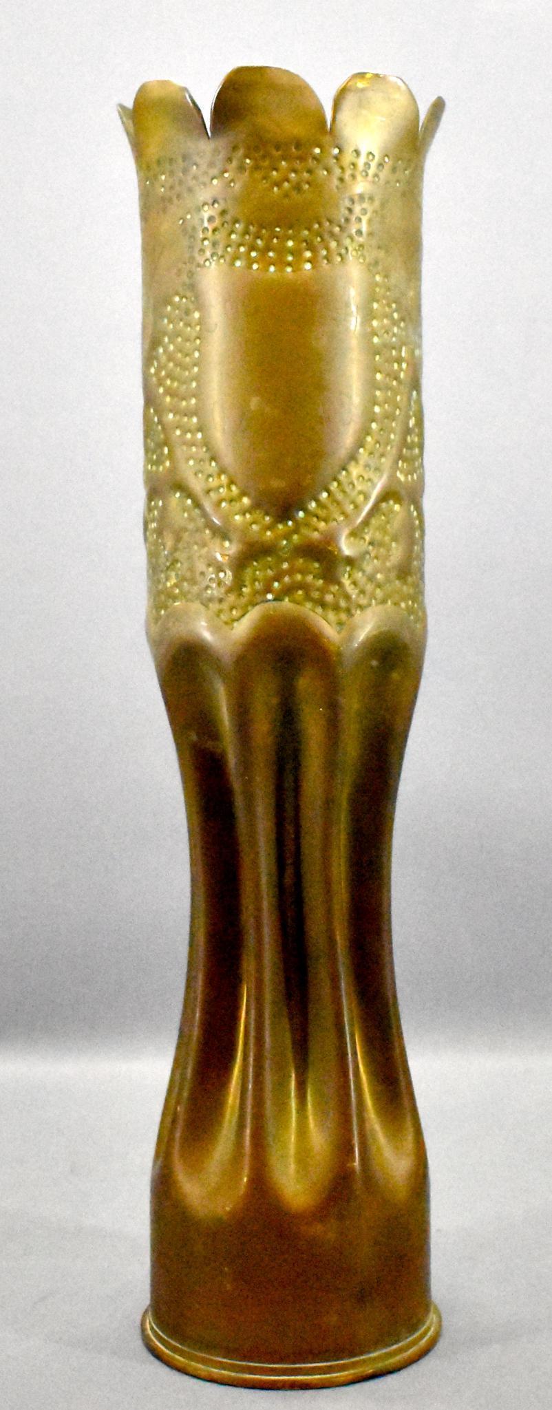 Large US / French WWI WWII trench art 75mm artillery: Large US / French WWI WWII trench art shell casing vase, uncertain as to when this was made but the bottom is marked 75 DEC 735L 18 C among other markings. The side has a small hreald with "Souvenir D