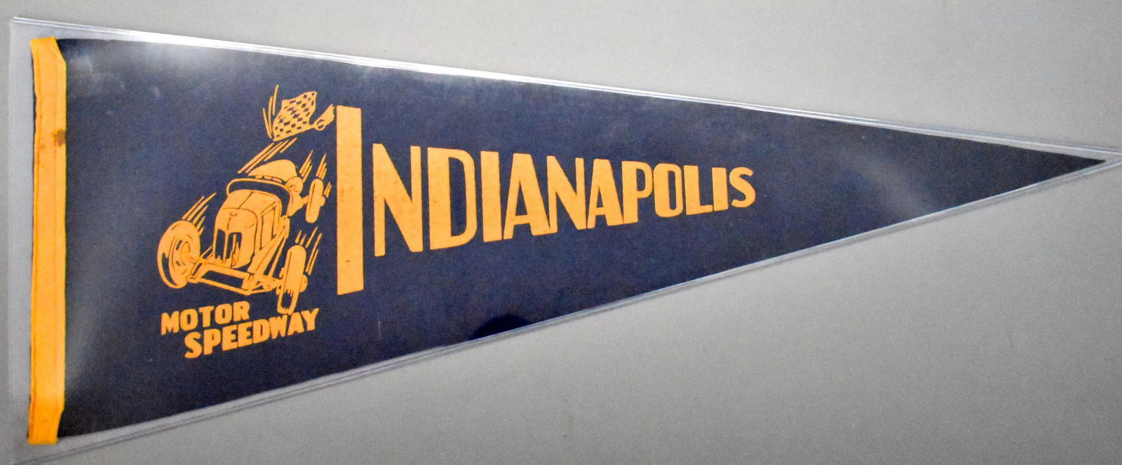Vintage Indy 500 Indianapolis Motor Speedway felt: Vintage Indy 500 Indianapolis Motor Speedway felt pennant from the 1920's or 30's, very good to excellent condition but has a small stain on the left border, measures 29 1/2" long.