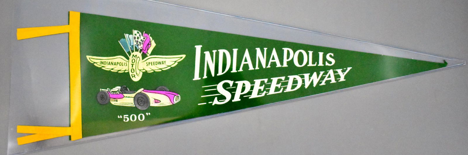 Vintage Indy 500 Indianapolis Motor Speedway felt: Vintage Indy 500 Indianapolis Motor Speedway felt pennant, smaller than the largest ones but still 27" long with 3 3/4" tassles and no holes, super condition.