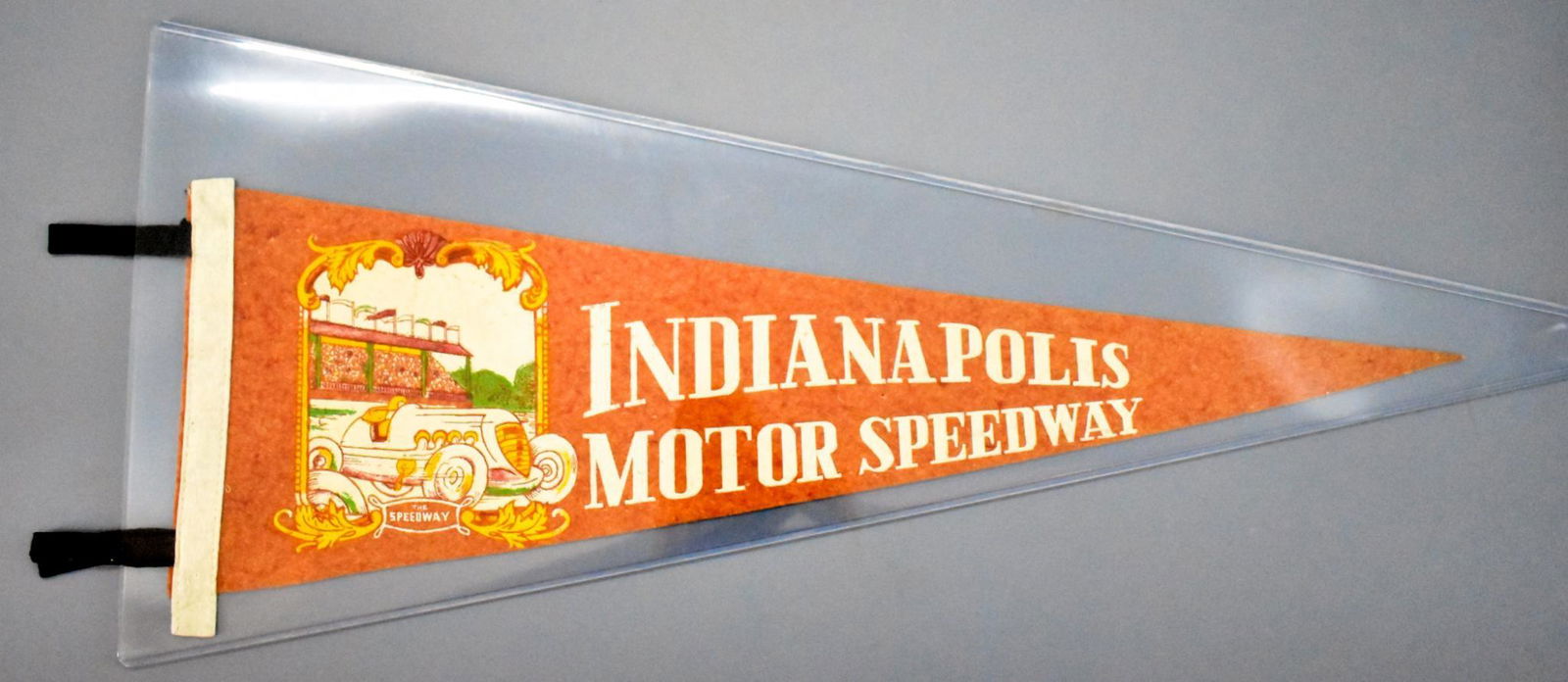 Vintage 1950's Indy 500 Indianapolis Motor Speedway: Vintage 1950's Indy 500 Indianapolis Motor Speedway felt pennant, slightly faded but nice shape with no holes, measures 25 1/2" long with 3" tassles.