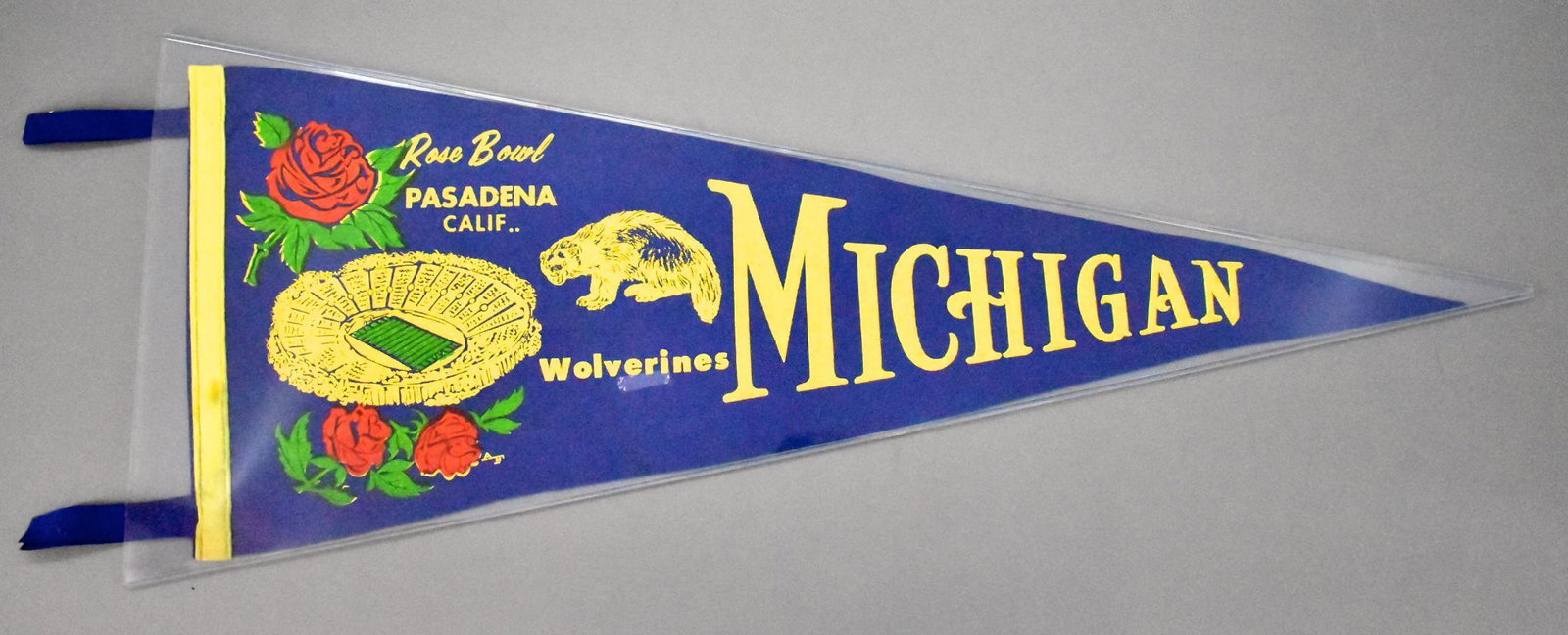 Vintage Michigan University Rose Bowl felt pennant: Vintage Michigan University Rose Bowl felt pennant, could be from the 1960's or 70's. It is in very good condition wand measures 29" long with 4" tassles.