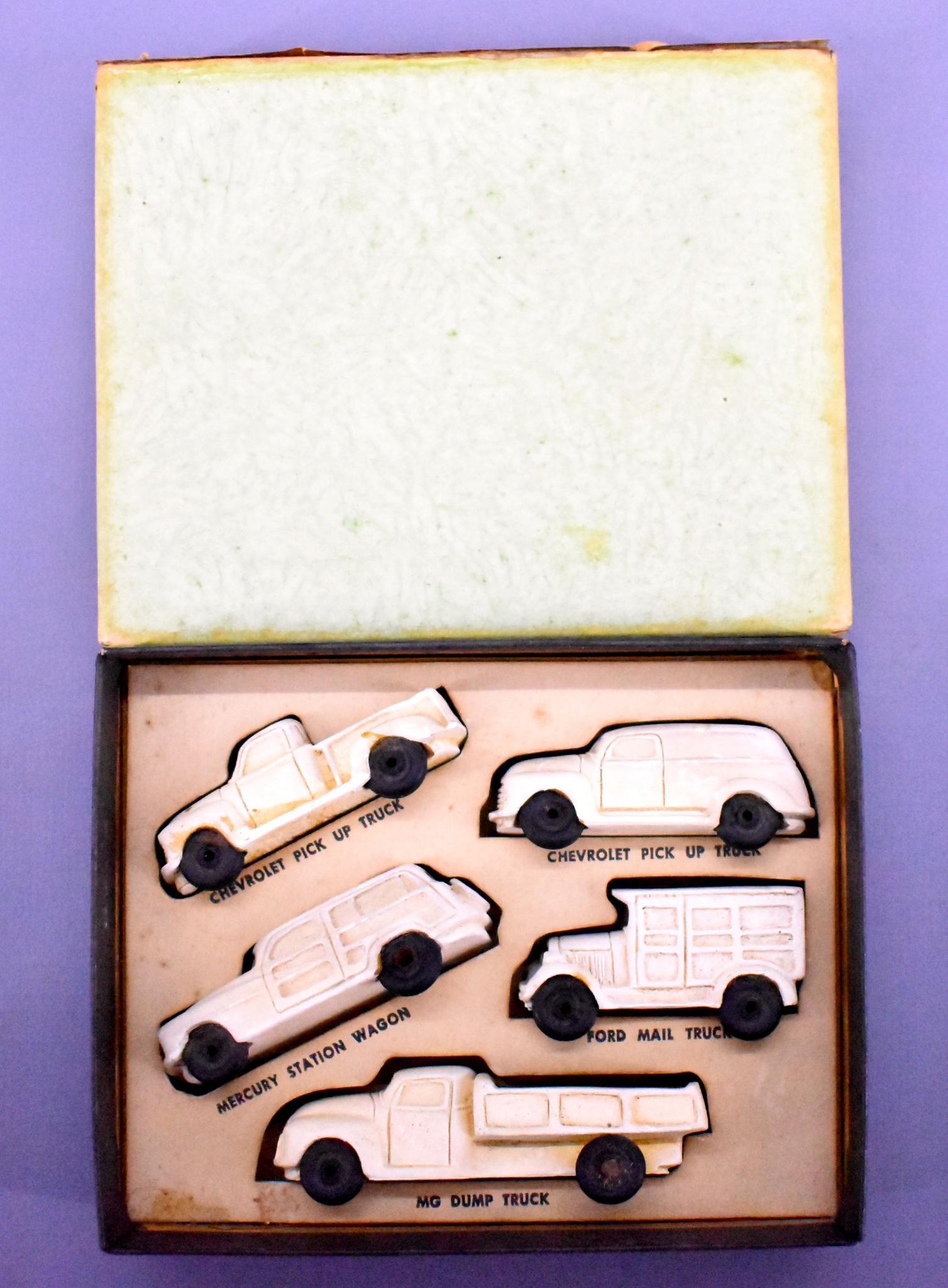 LeRoy Toy and Novelty Co Kit No D small scale vehicles: LeRoy Toy and Novelty Co Kit No D small scale vehicles for HO scale trains. The long truck with an open bed measures 2 7/8" long which equates to 20' long. These are likely just a little too big for H